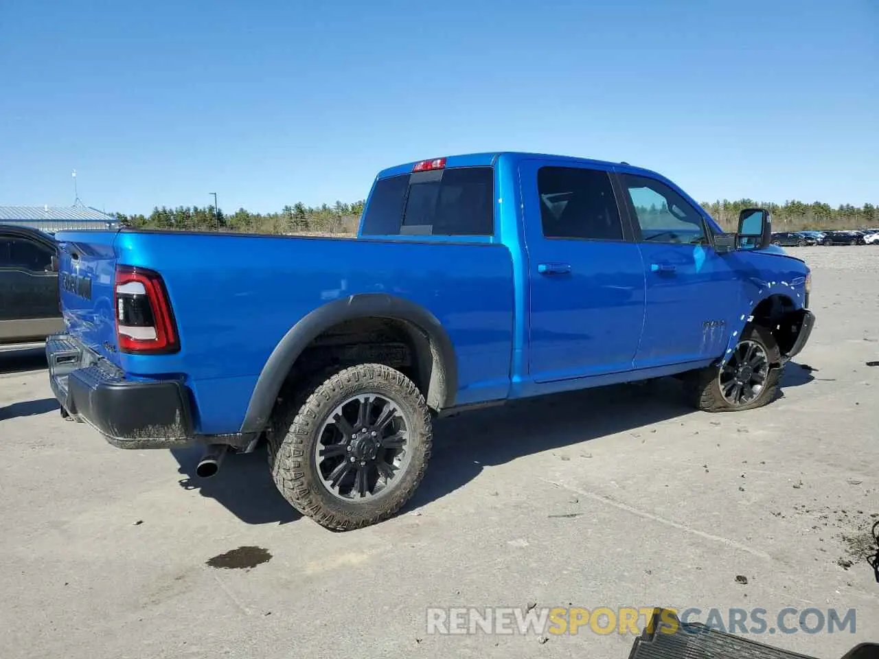 3 Photograph of a damaged car 3C6UR5EJ7RG140360 RAM 2500 2024