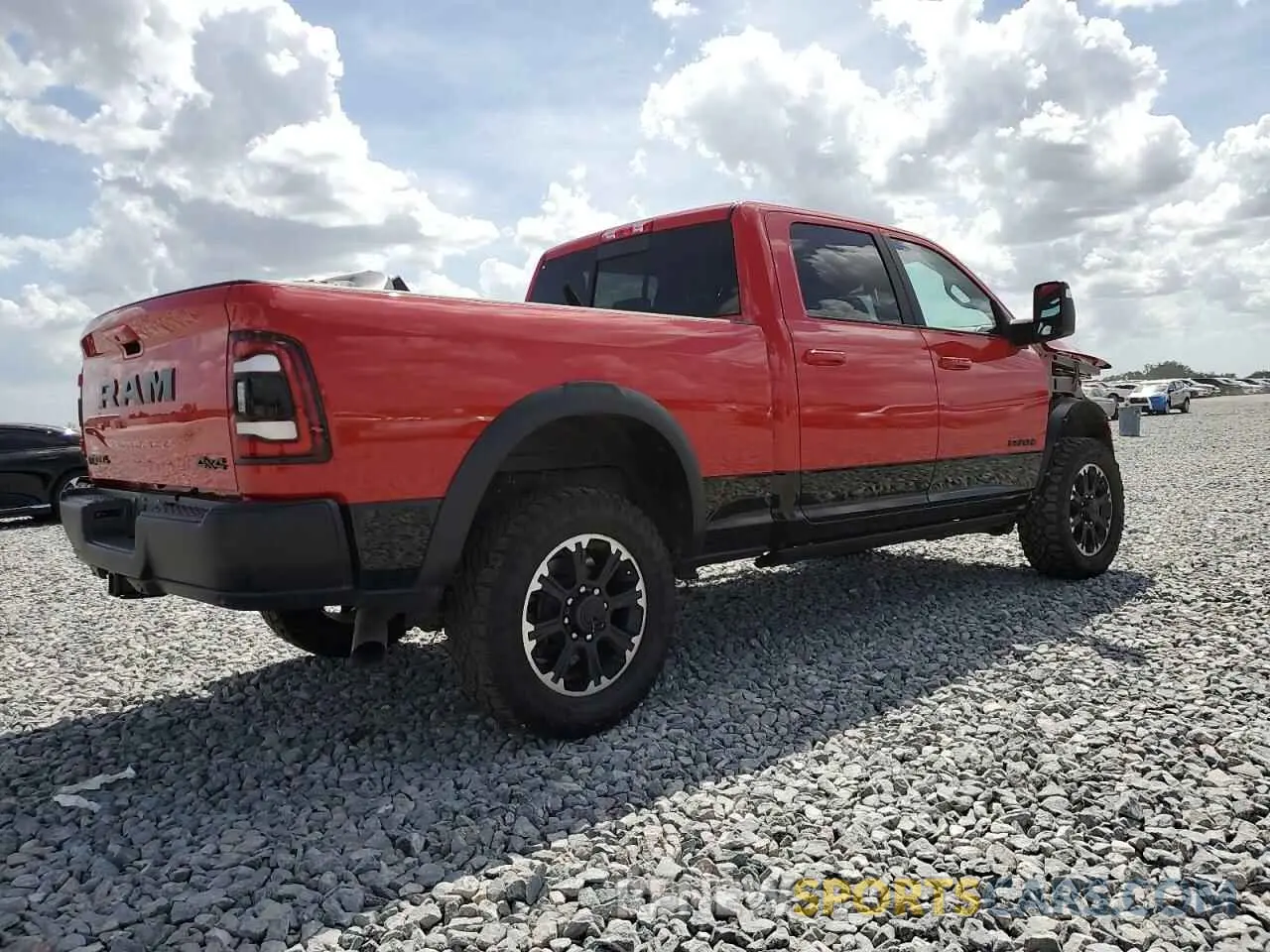 3 Photograph of a damaged car 3C6UR5EL0RG207351 RAM 2500 2024