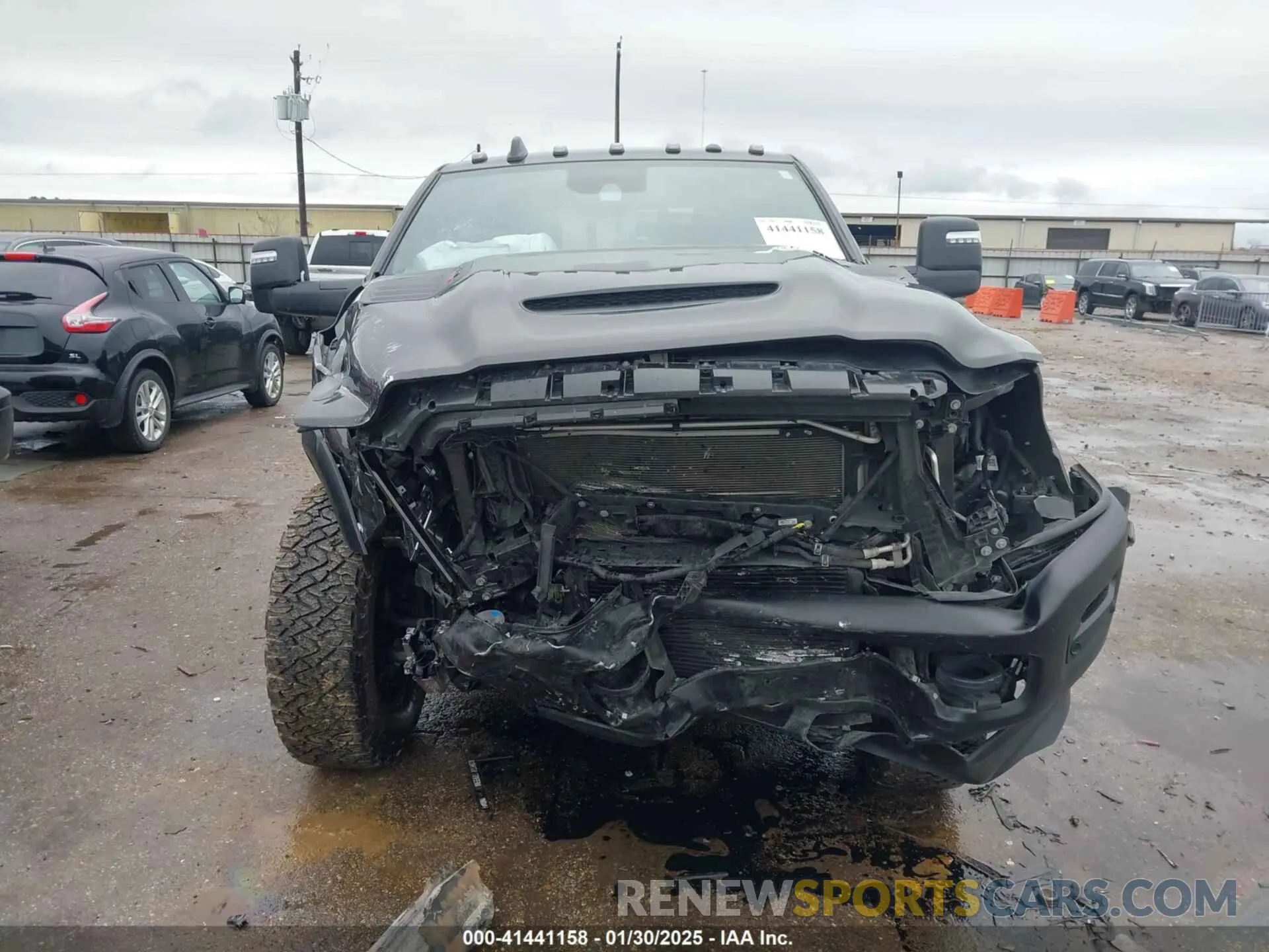 13 Photograph of a damaged car 3C6UR5EL1RG158371 RAM 2500 2024
