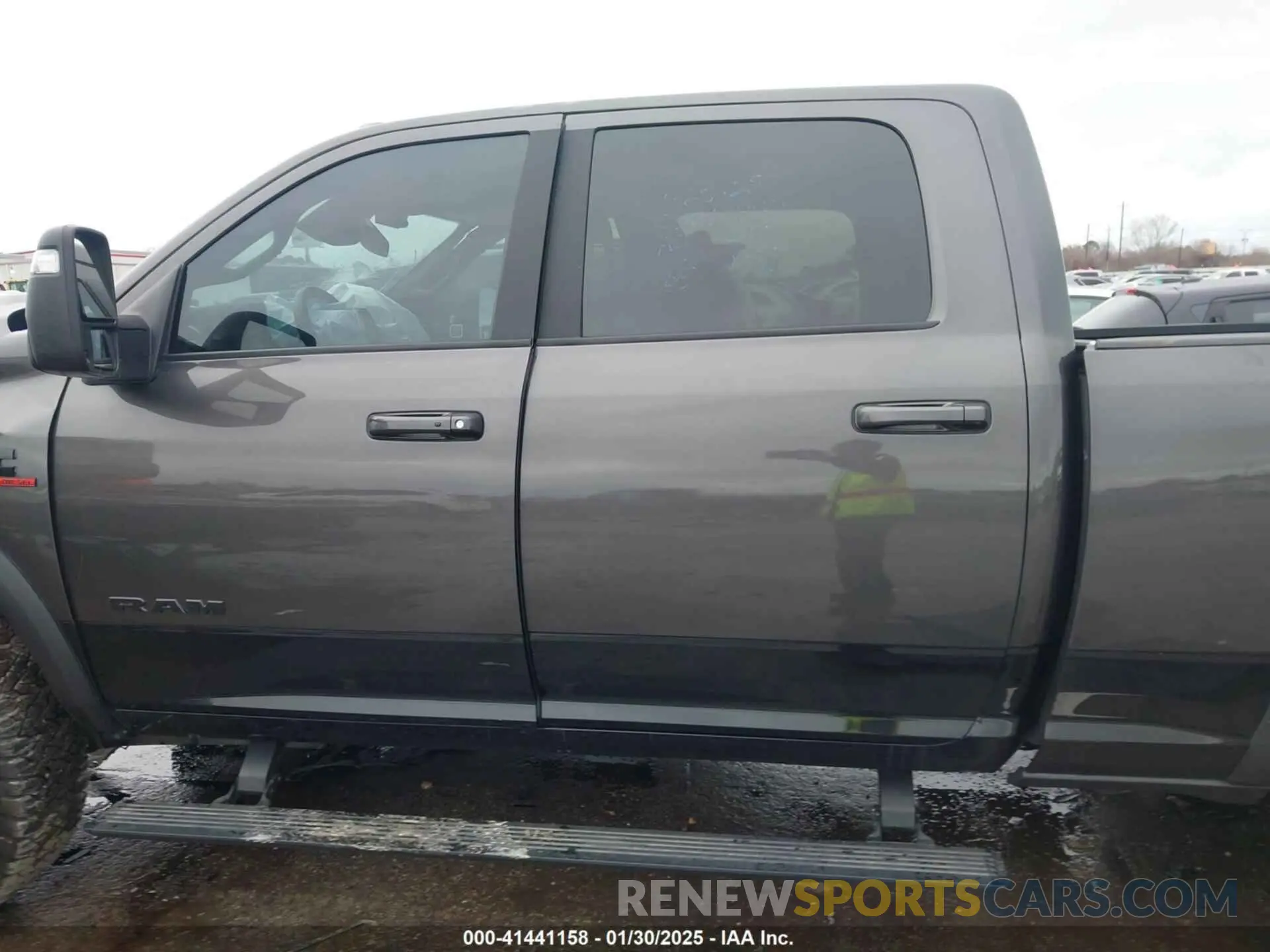 15 Photograph of a damaged car 3C6UR5EL1RG158371 RAM 2500 2024