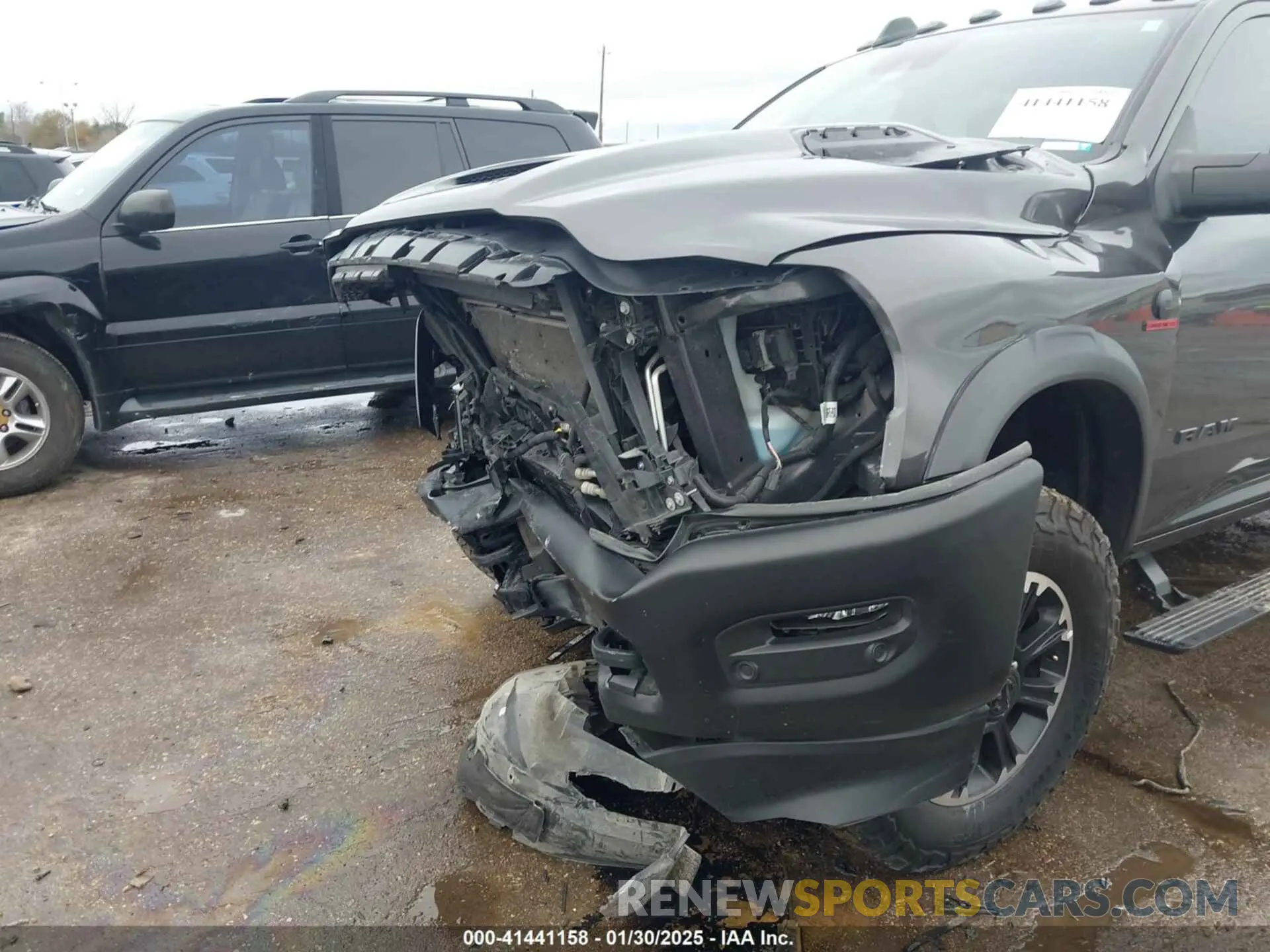 6 Photograph of a damaged car 3C6UR5EL1RG158371 RAM 2500 2024