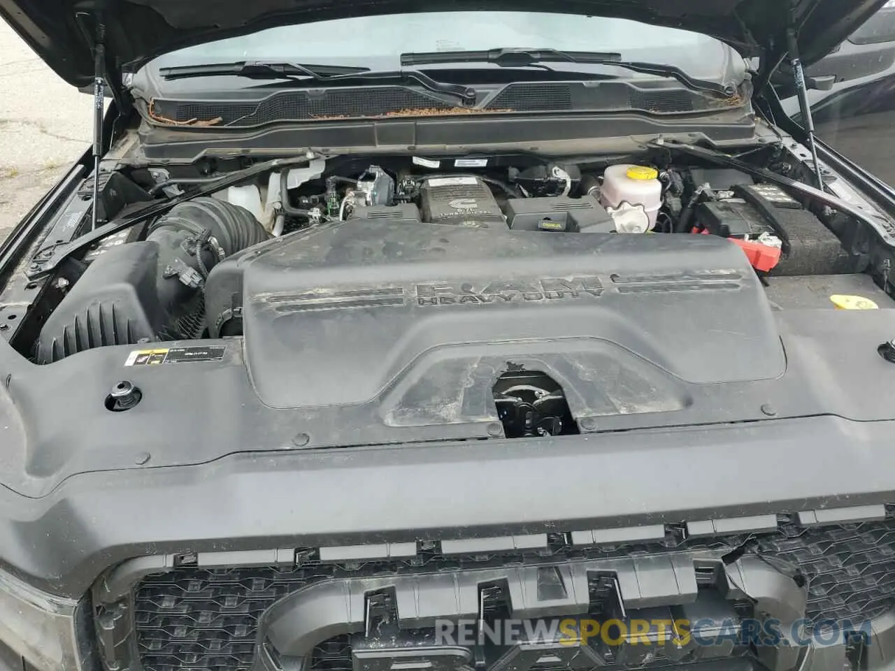 11 Photograph of a damaged car 3C6UR5EL4RG131875 RAM 2500 2024