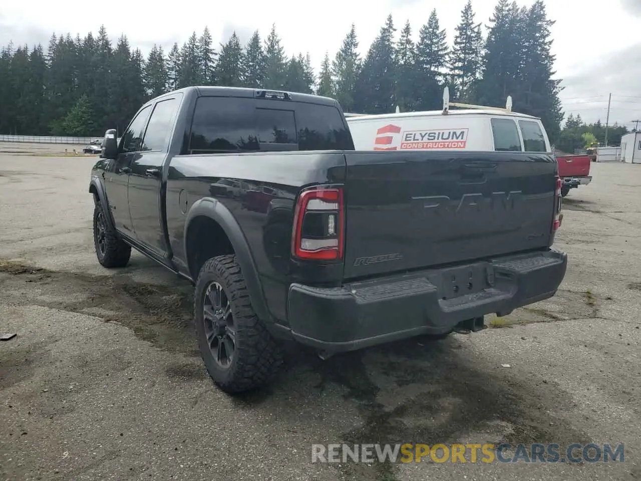 2 Photograph of a damaged car 3C6UR5EL4RG131875 RAM 2500 2024