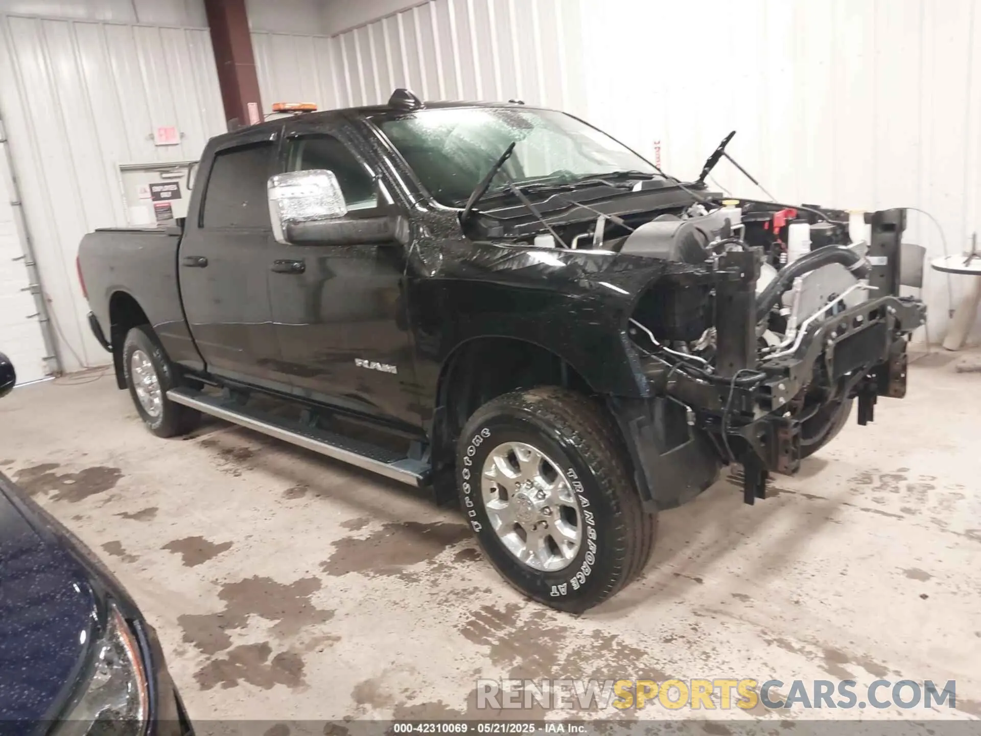 1 Photograph of a damaged car 3C6UR5FJ2RG186581 RAM 2500 2024