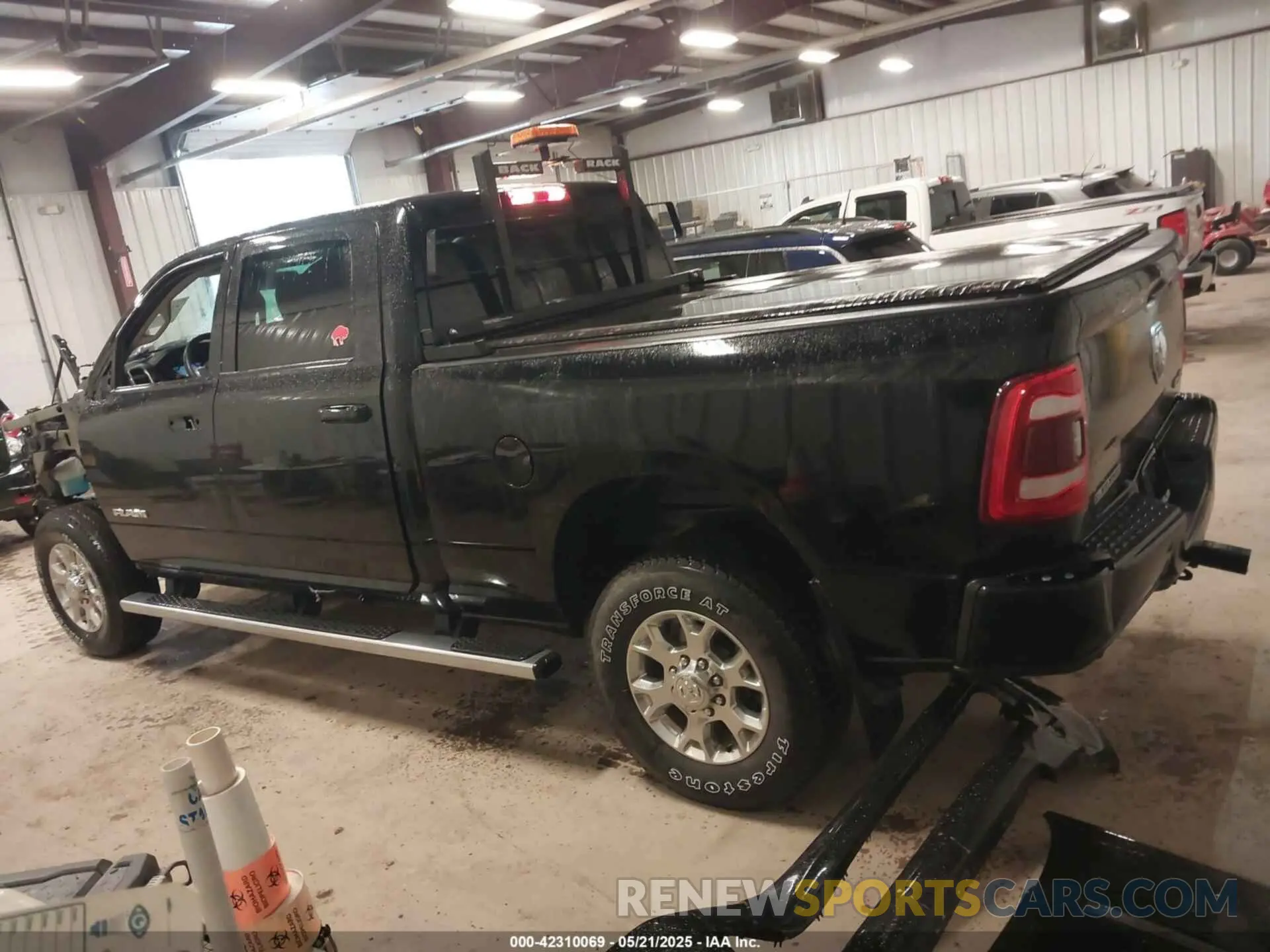 15 Photograph of a damaged car 3C6UR5FJ2RG186581 RAM 2500 2024