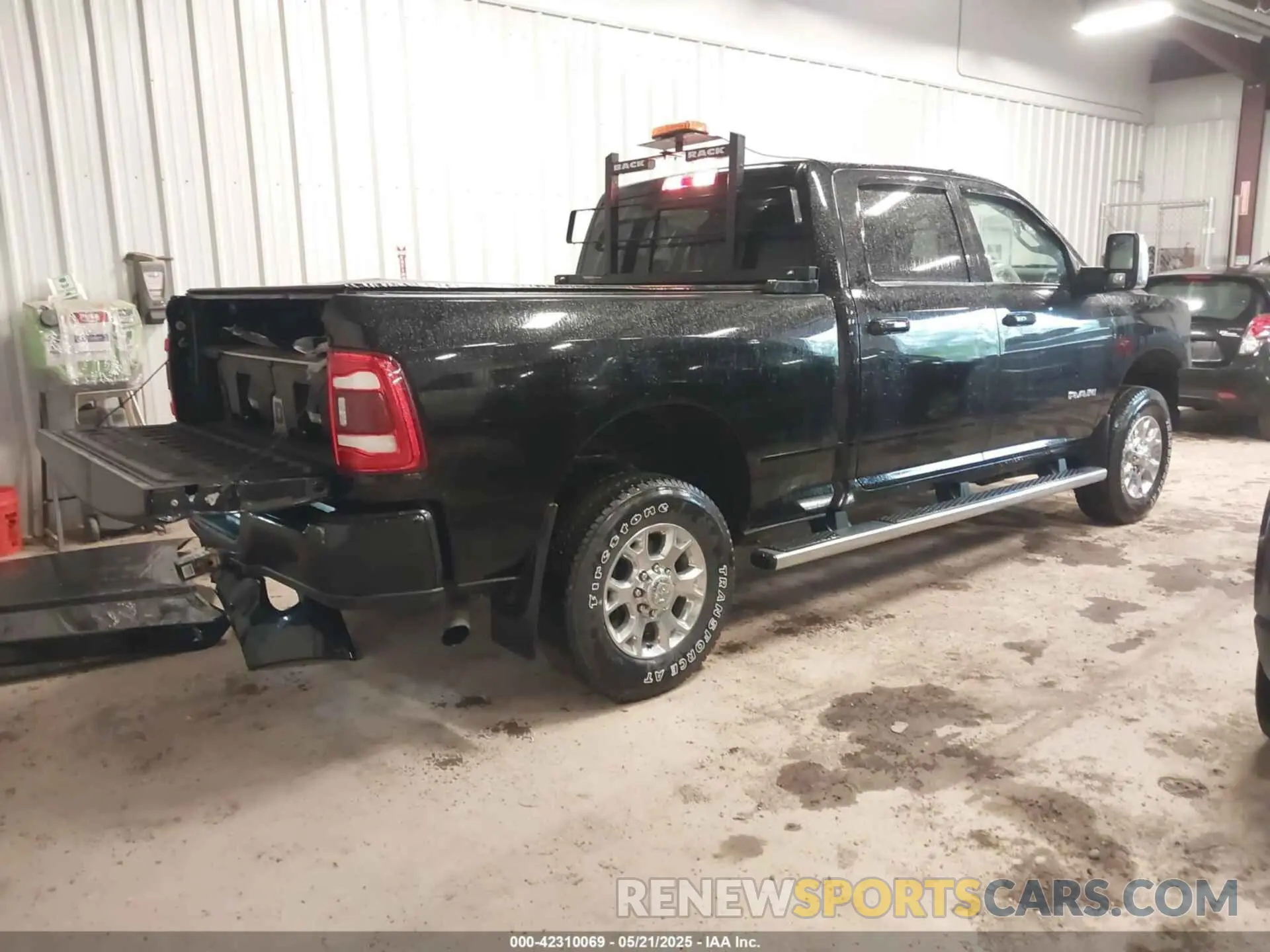 4 Photograph of a damaged car 3C6UR5FJ2RG186581 RAM 2500 2024