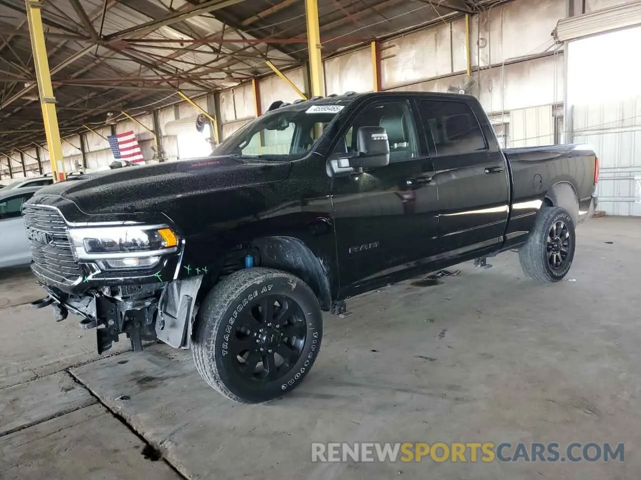 1 Photograph of a damaged car 3C6UR5FJ3RG188176 RAM 2500 2024