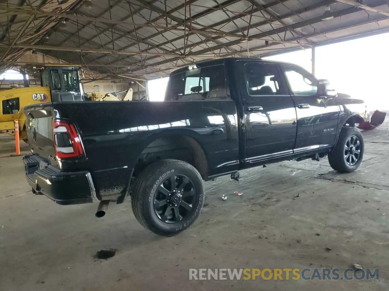 3 Photograph of a damaged car 3C6UR5FJ3RG188176 RAM 2500 2024