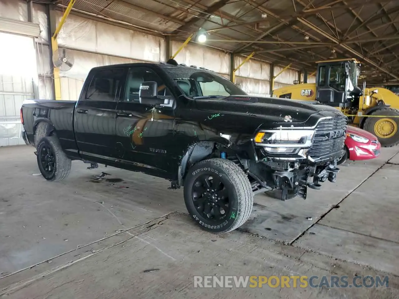 4 Photograph of a damaged car 3C6UR5FJ3RG188176 RAM 2500 2024
