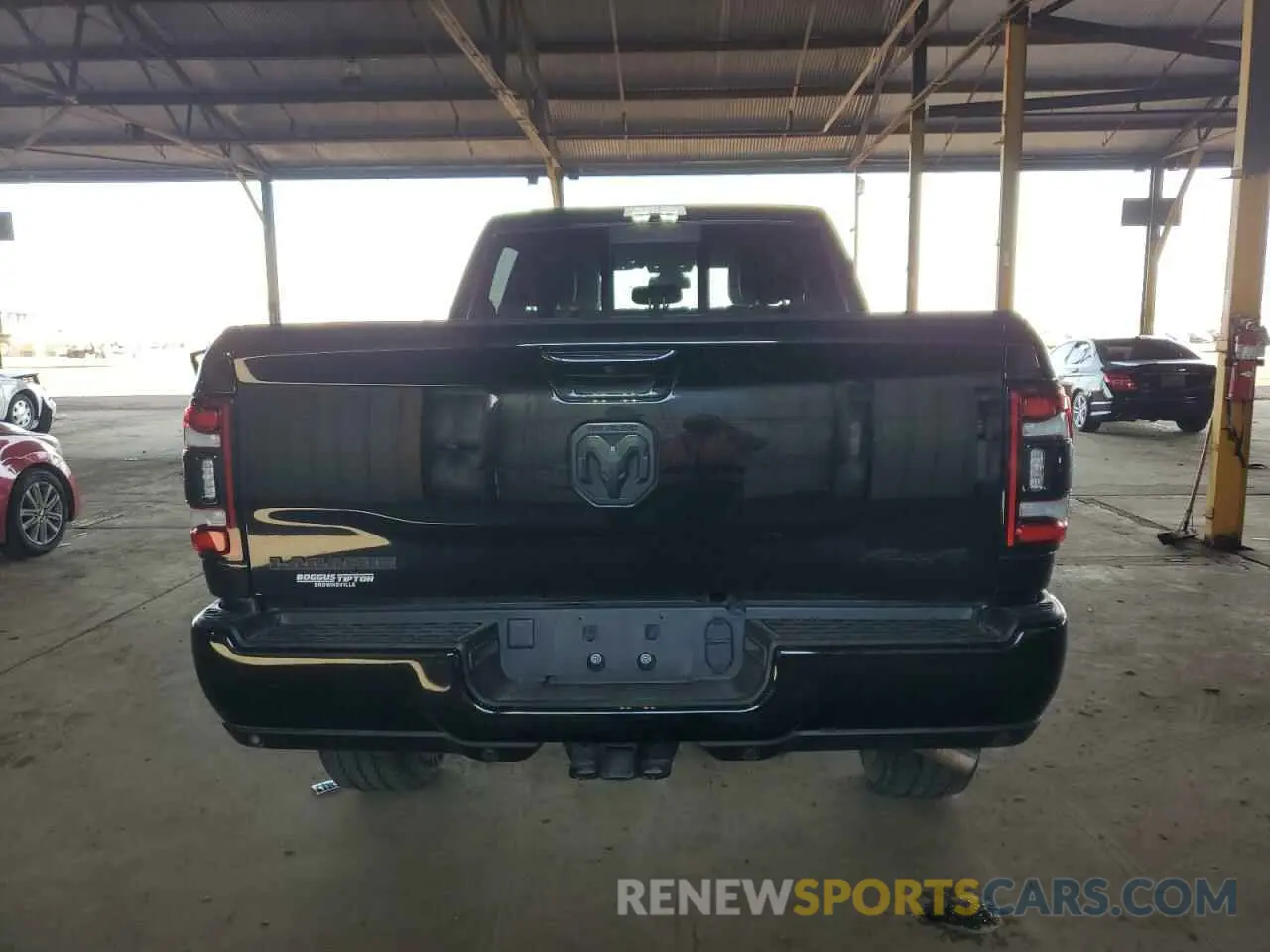 6 Photograph of a damaged car 3C6UR5FJ3RG188176 RAM 2500 2024