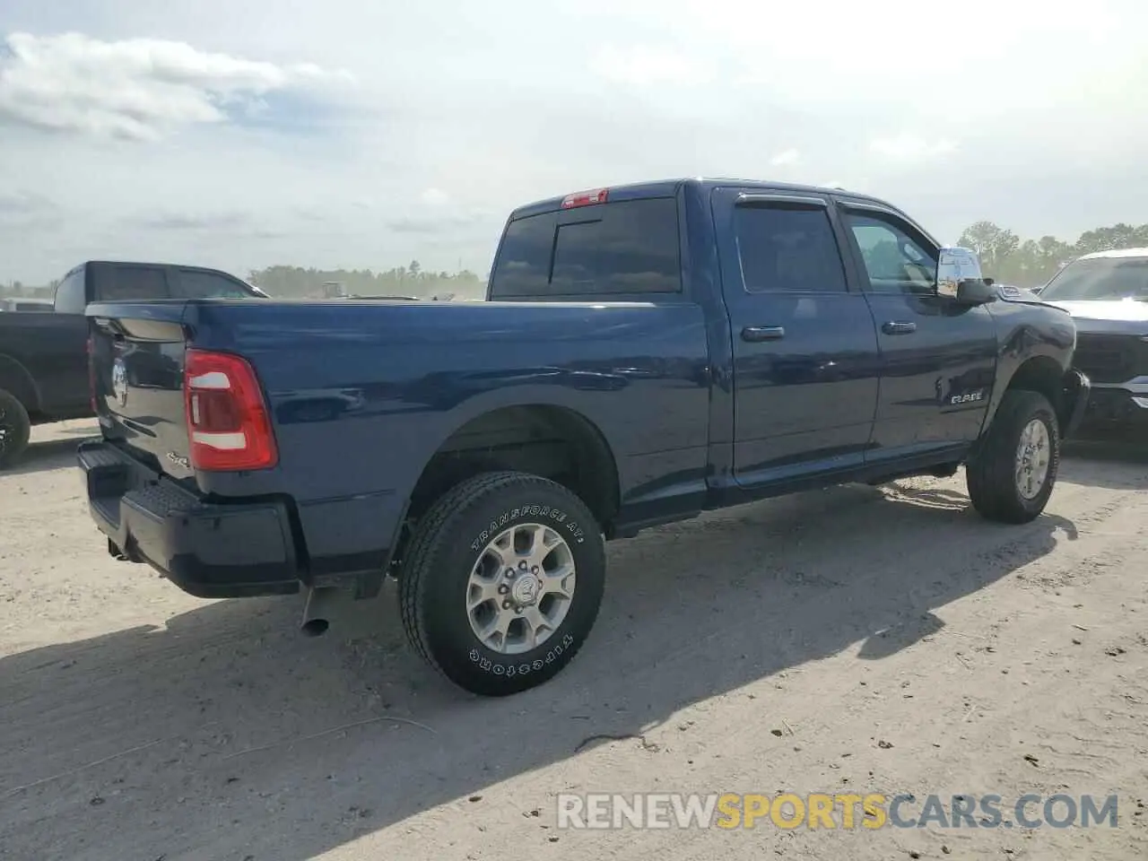 3 Photograph of a damaged car 3C6UR5FJ3RG351408 RAM 2500 2024