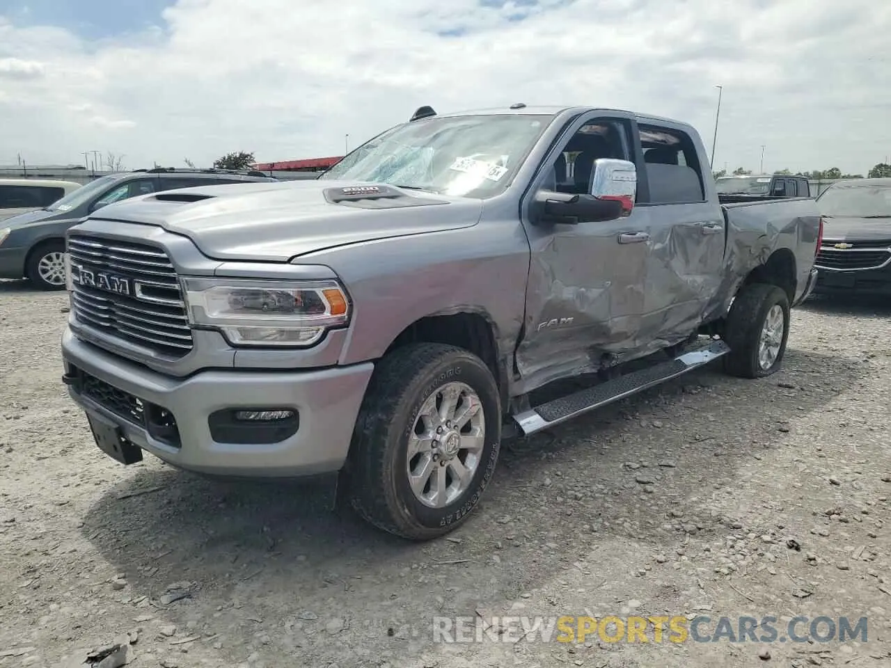 1 Photograph of a damaged car 3C6UR5FJ3RG365650 RAM 2500 2024