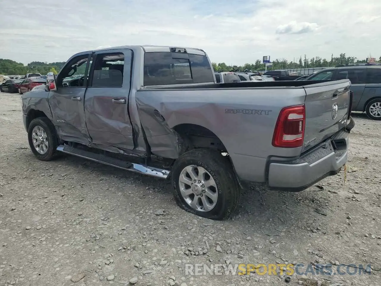 2 Photograph of a damaged car 3C6UR5FJ3RG365650 RAM 2500 2024