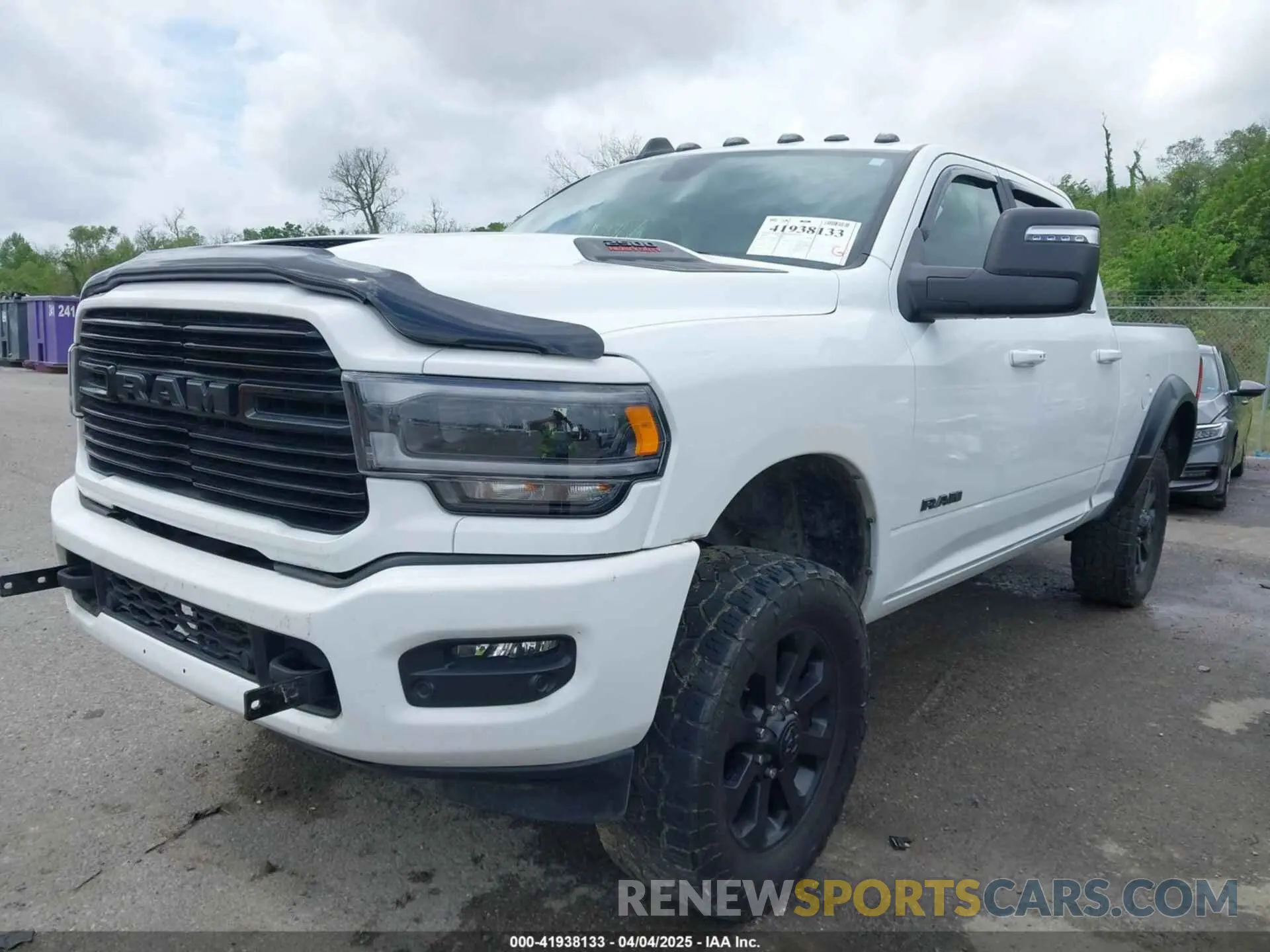 2 Photograph of a damaged car 3C6UR5FJ4RG190342 RAM 2500 2024