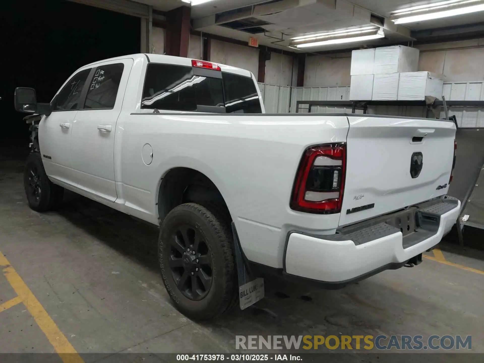 3 Photograph of a damaged car 3C6UR5FJ7RG143466 RAM 2500 2024