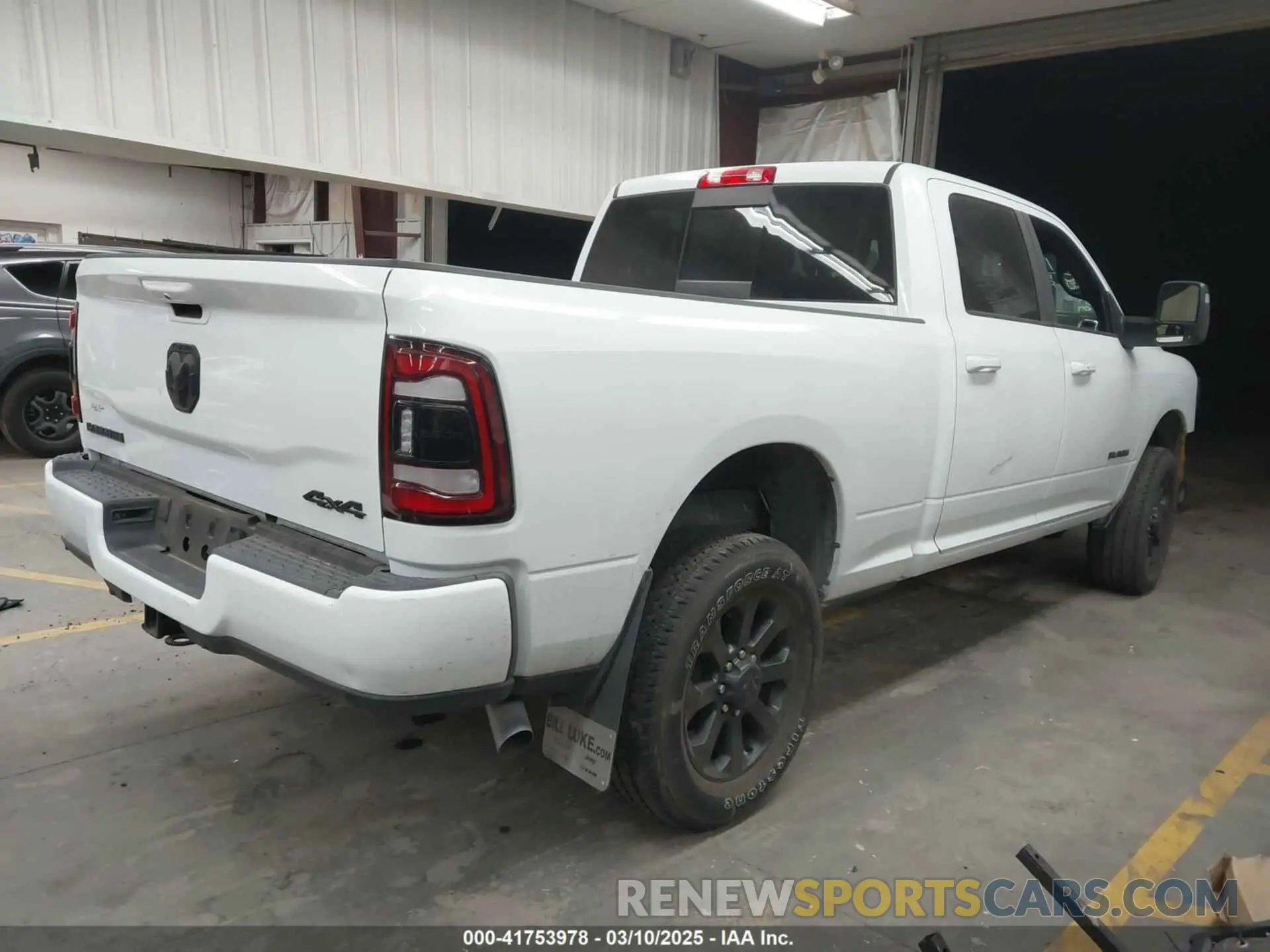 4 Photograph of a damaged car 3C6UR5FJ7RG143466 RAM 2500 2024