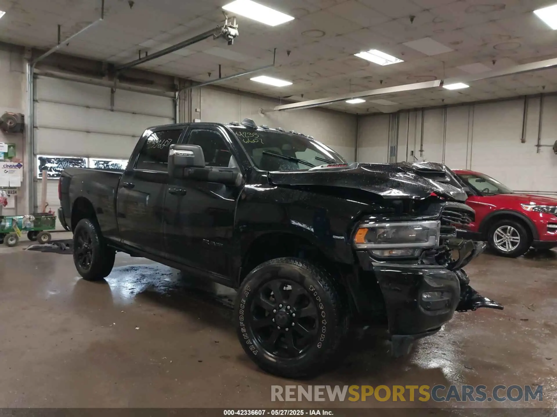 1 Photograph of a damaged car 3C6UR5FJ8RG207417 RAM 2500 2024