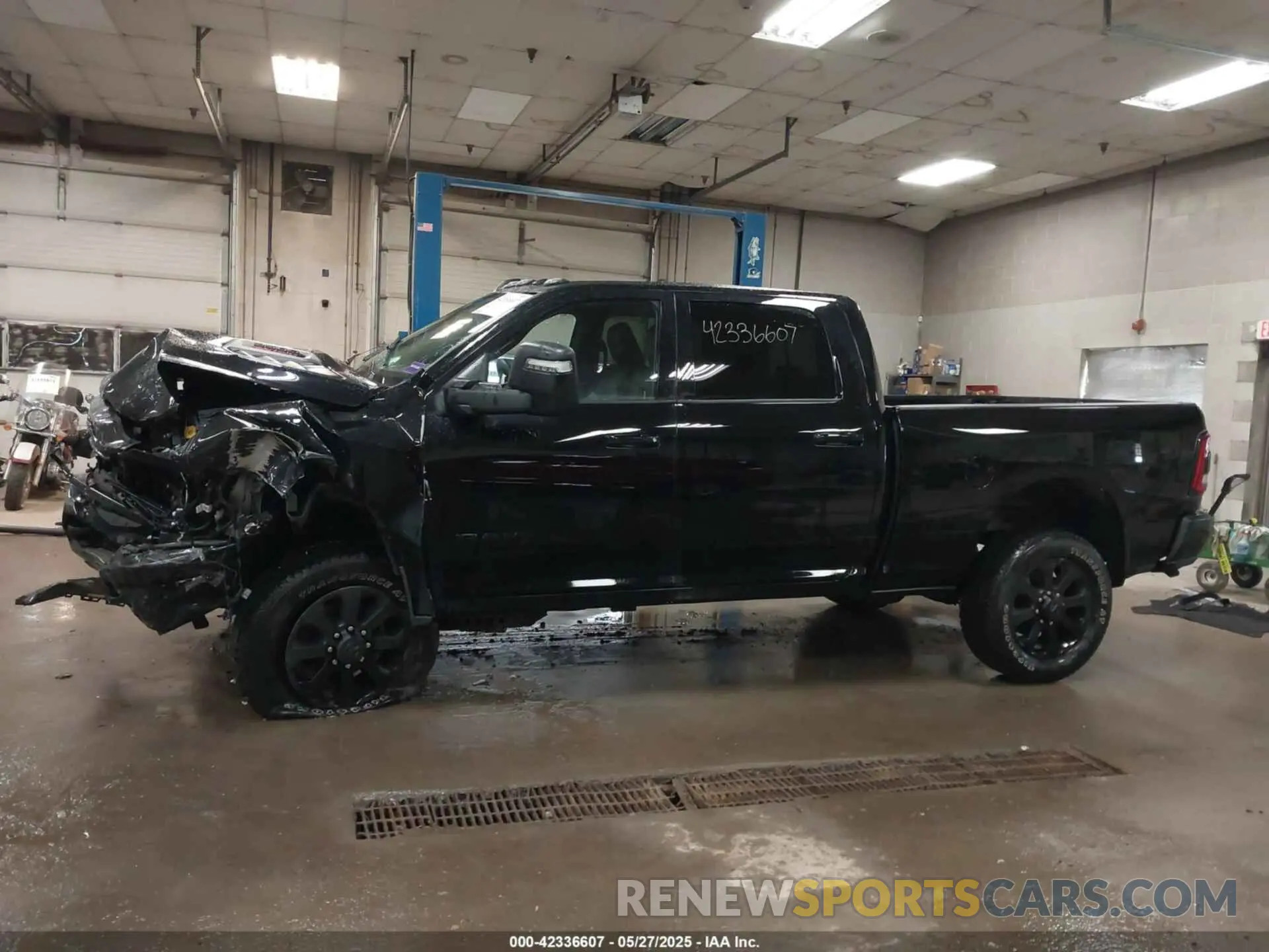 14 Photograph of a damaged car 3C6UR5FJ8RG207417 RAM 2500 2024