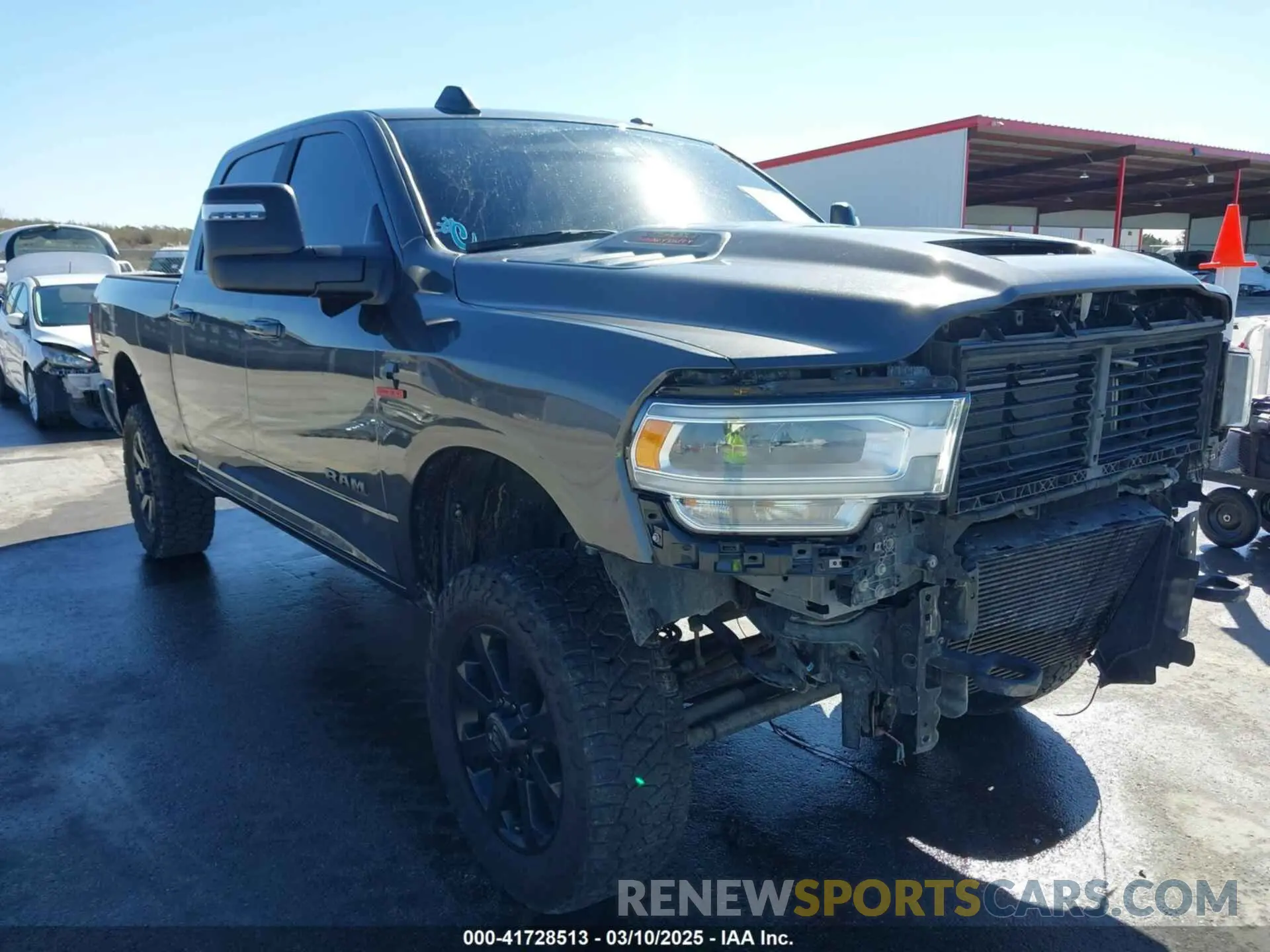 1 Photograph of a damaged car 3C6UR5FL0RG117504 RAM 2500 2024