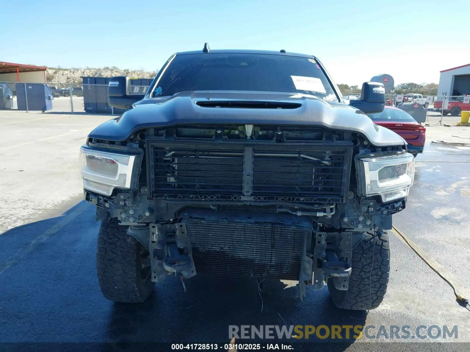 13 Photograph of a damaged car 3C6UR5FL0RG117504 RAM 2500 2024