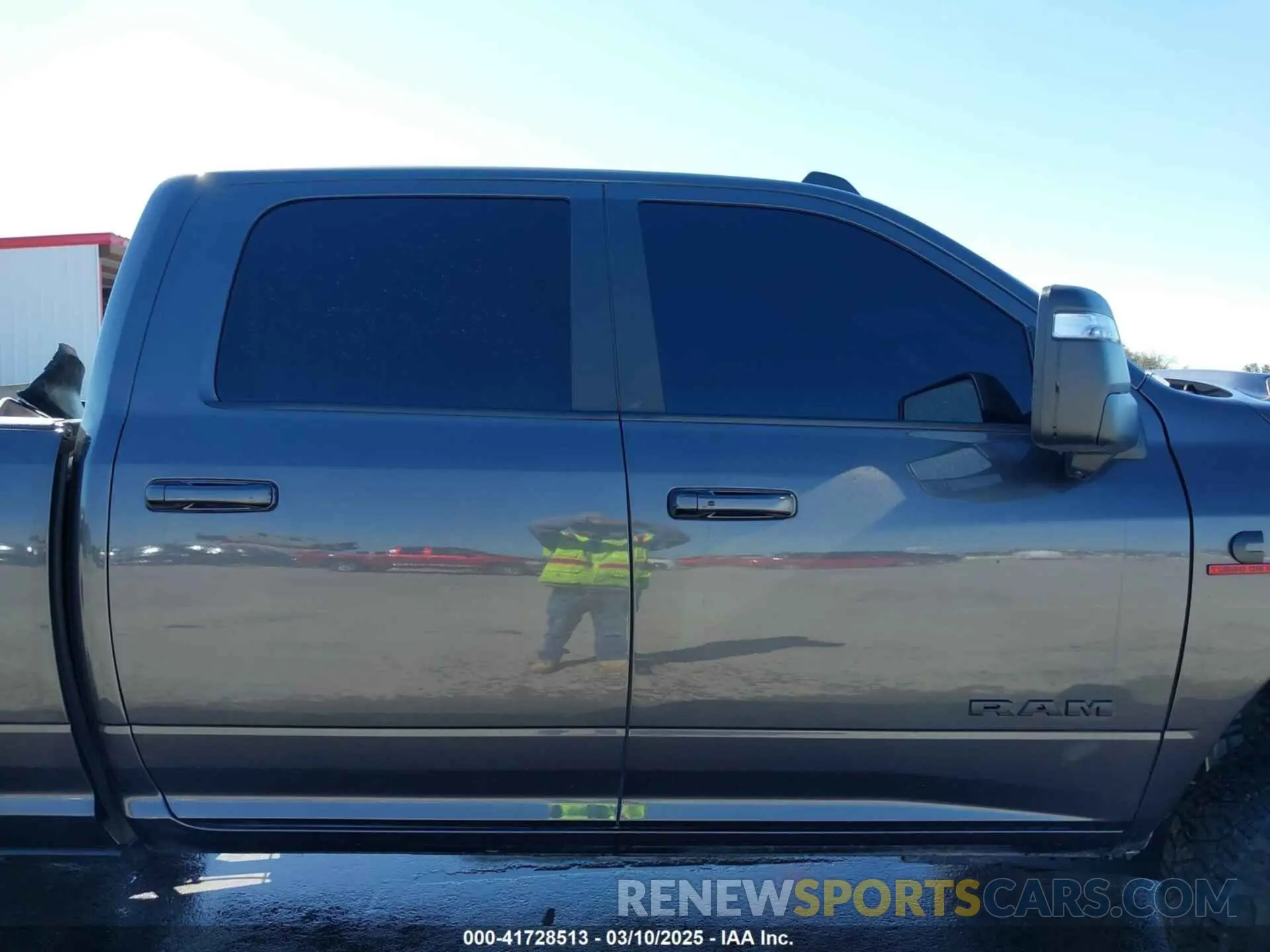 14 Photograph of a damaged car 3C6UR5FL0RG117504 RAM 2500 2024