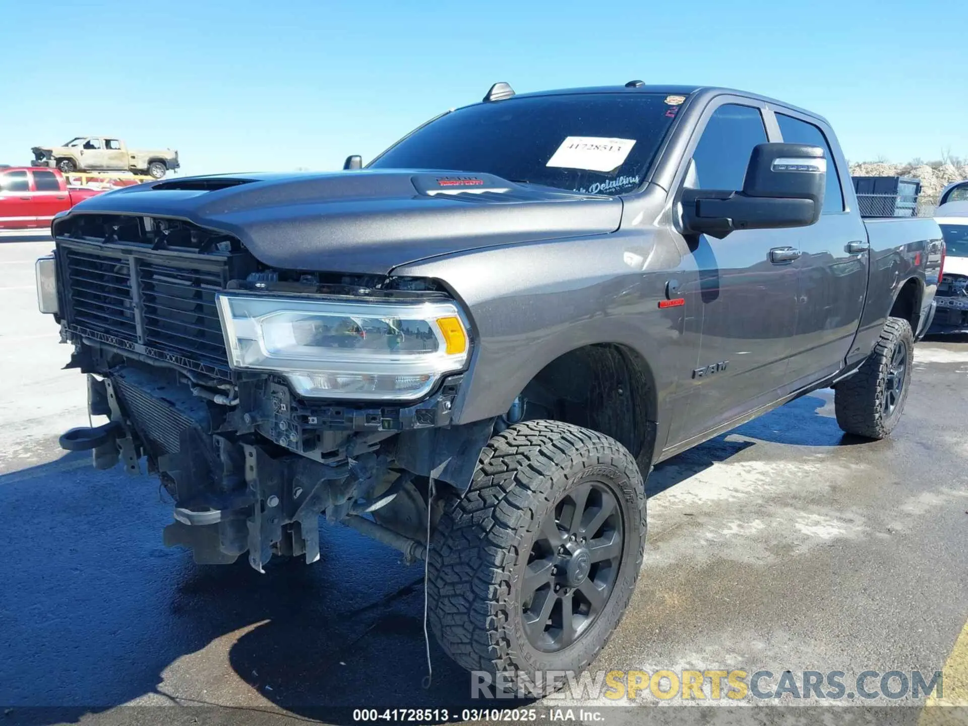 2 Photograph of a damaged car 3C6UR5FL0RG117504 RAM 2500 2024