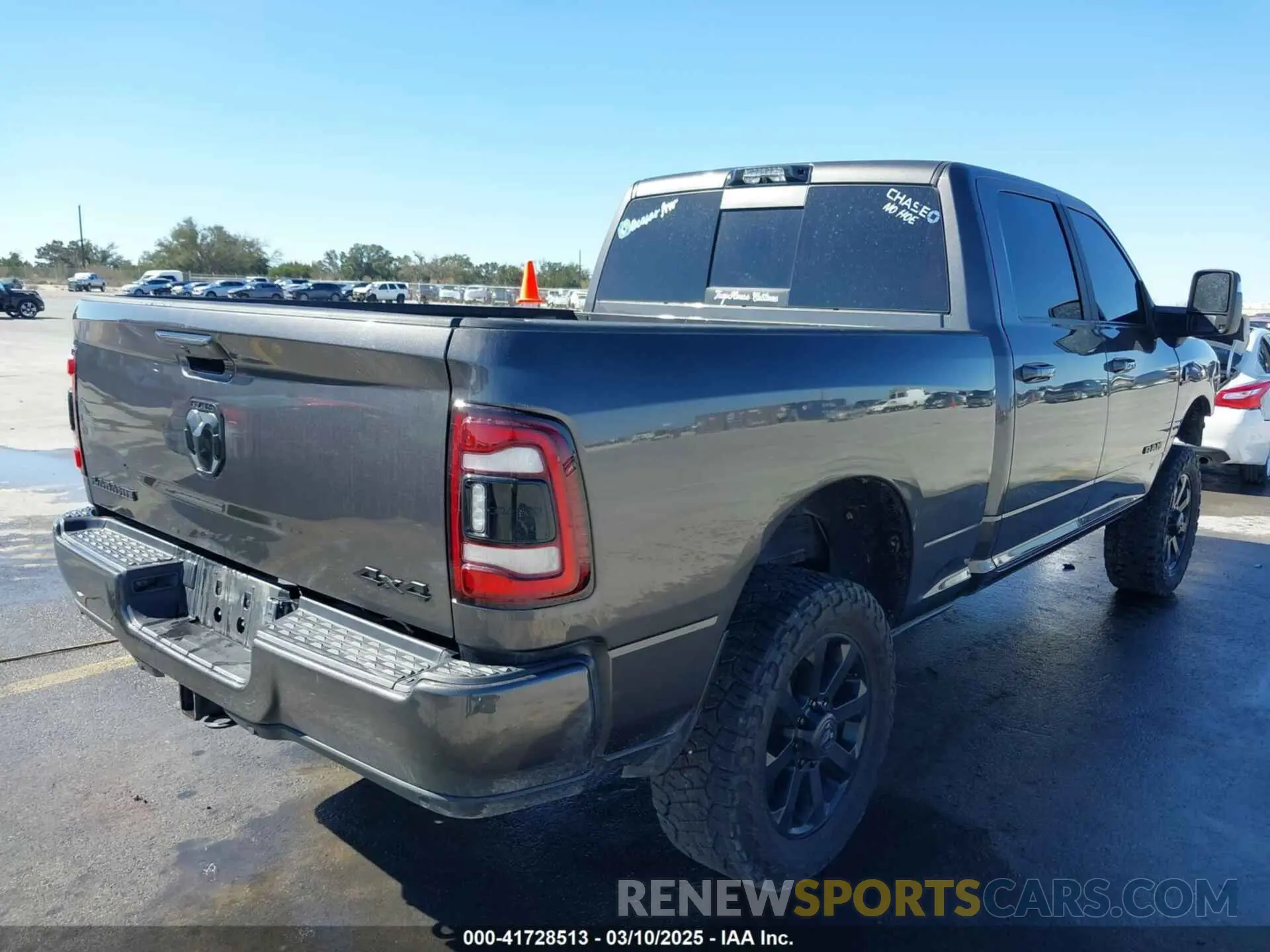 4 Photograph of a damaged car 3C6UR5FL0RG117504 RAM 2500 2024