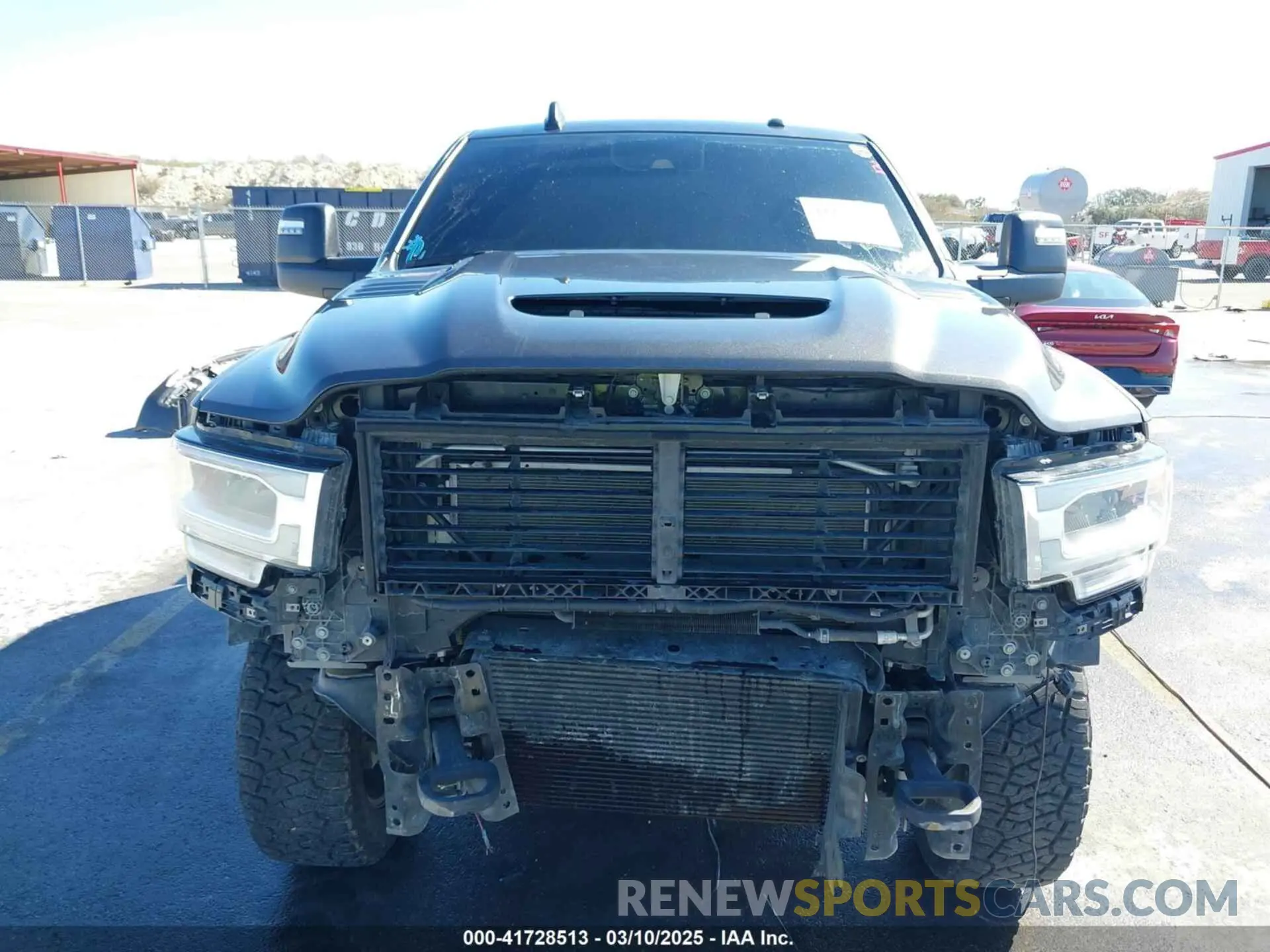 6 Photograph of a damaged car 3C6UR5FL0RG117504 RAM 2500 2024