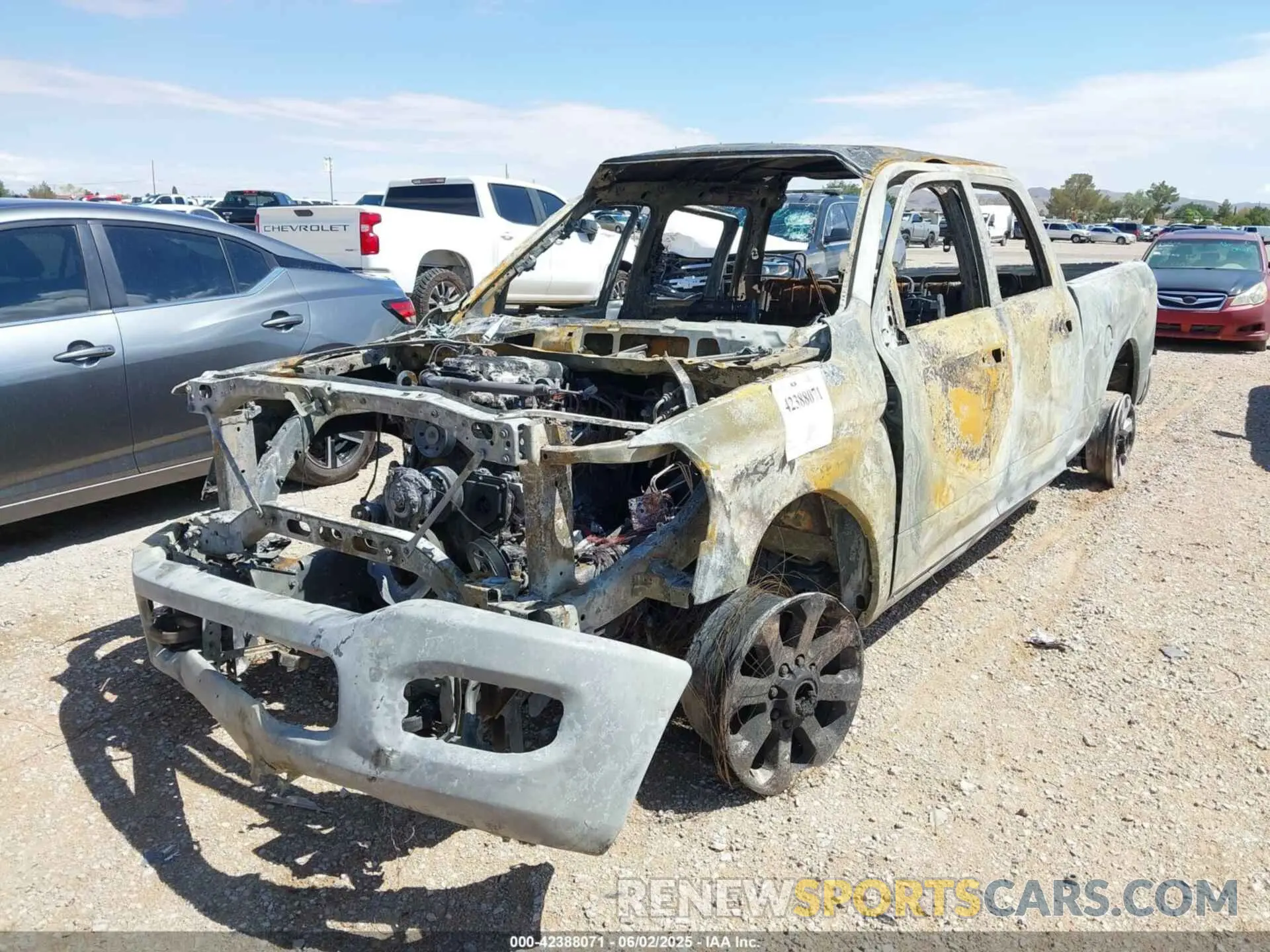 2 Photograph of a damaged car 3C6UR5FL0RG264485 RAM 2500 2024
