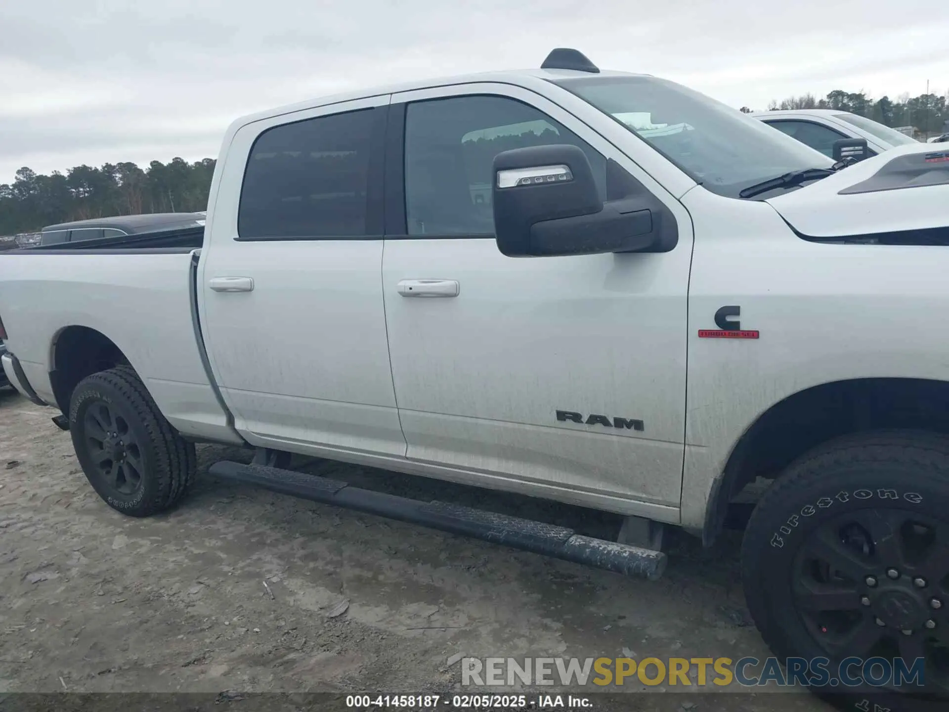 13 Photograph of a damaged car 3C6UR5FL1RG252877 RAM 2500 2024