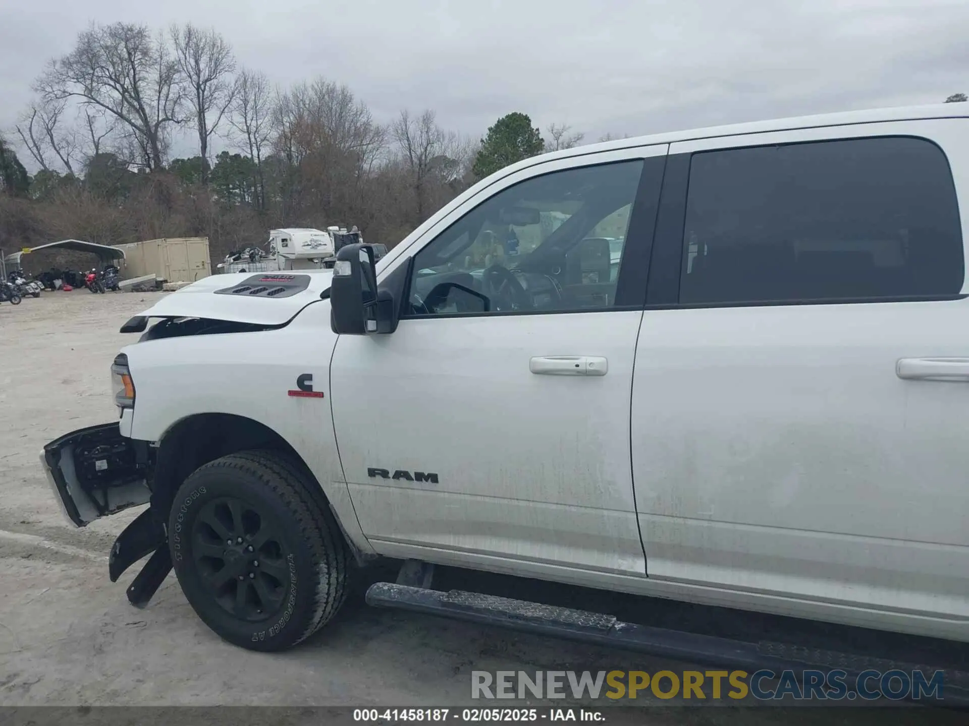 14 Photograph of a damaged car 3C6UR5FL1RG252877 RAM 2500 2024