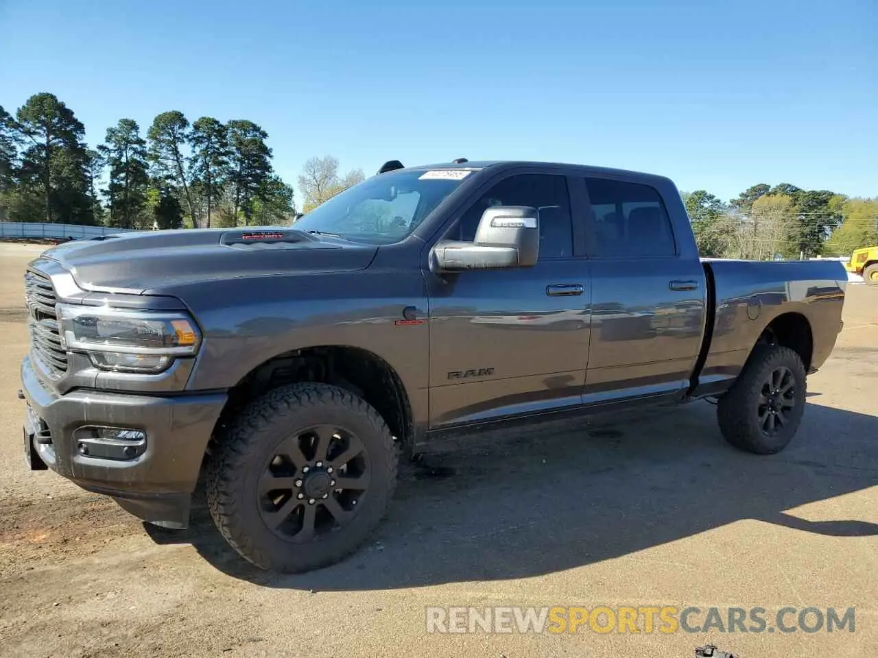 1 Photograph of a damaged car 3C6UR5FL1RG264401 RAM 2500 2024