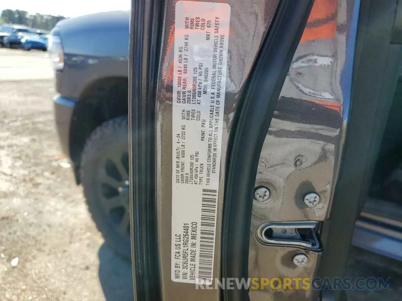 12 Photograph of a damaged car 3C6UR5FL1RG264401 RAM 2500 2024