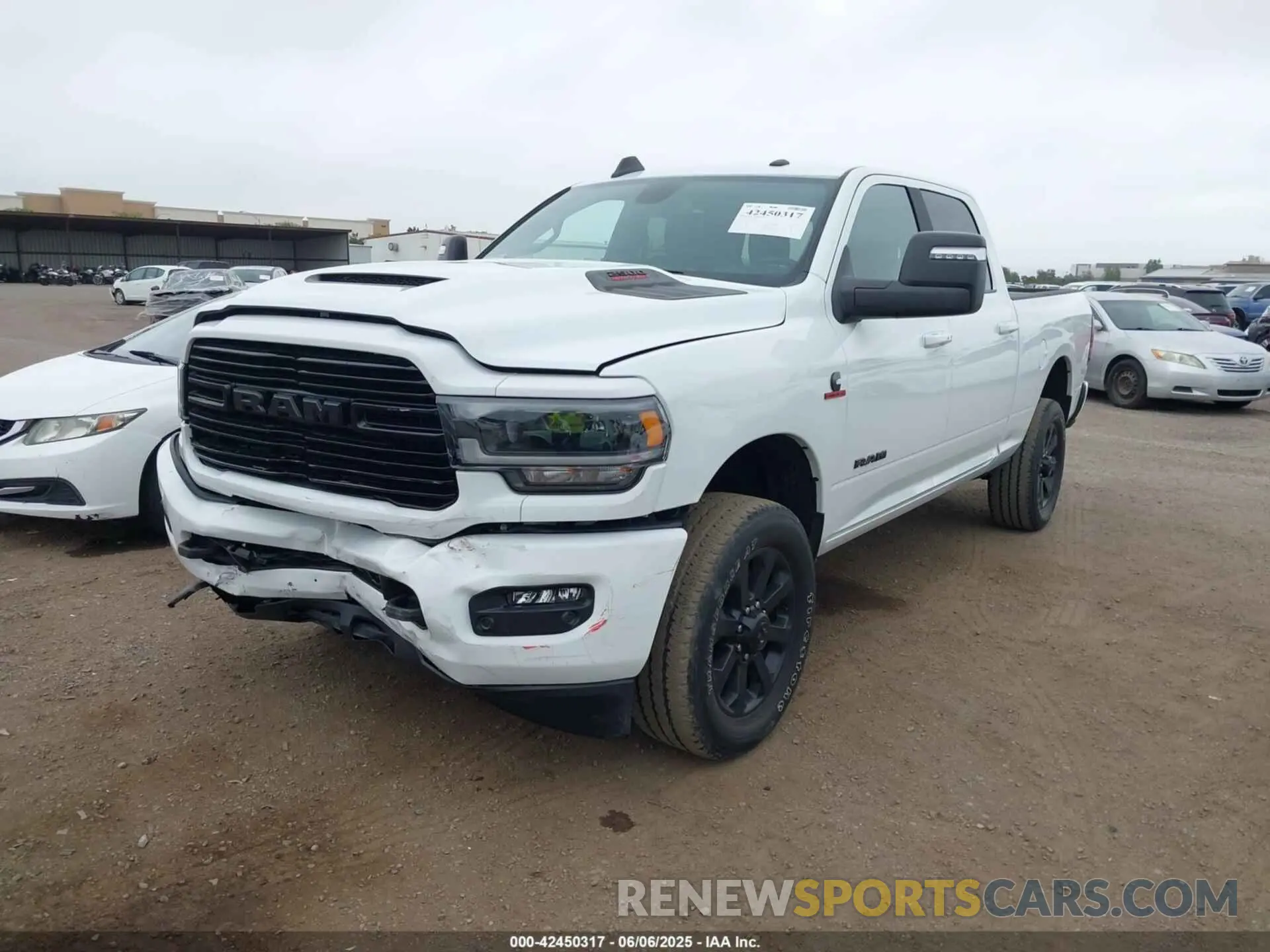 2 Photograph of a damaged car 3C6UR5FL1RG279271 RAM 2500 2024