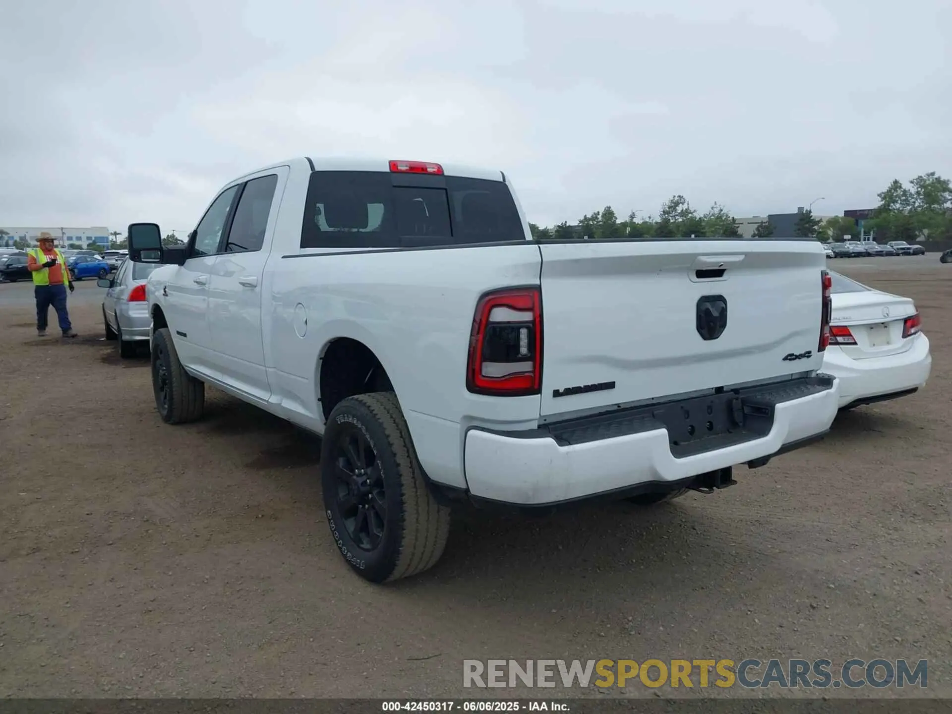 3 Photograph of a damaged car 3C6UR5FL1RG279271 RAM 2500 2024