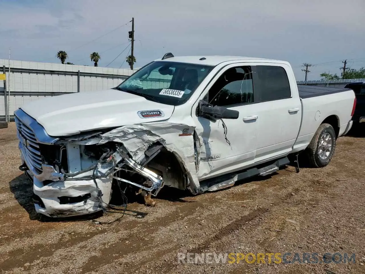 1 Photograph of a damaged car 3C6UR5FL1RG341106 RAM 2500 2024