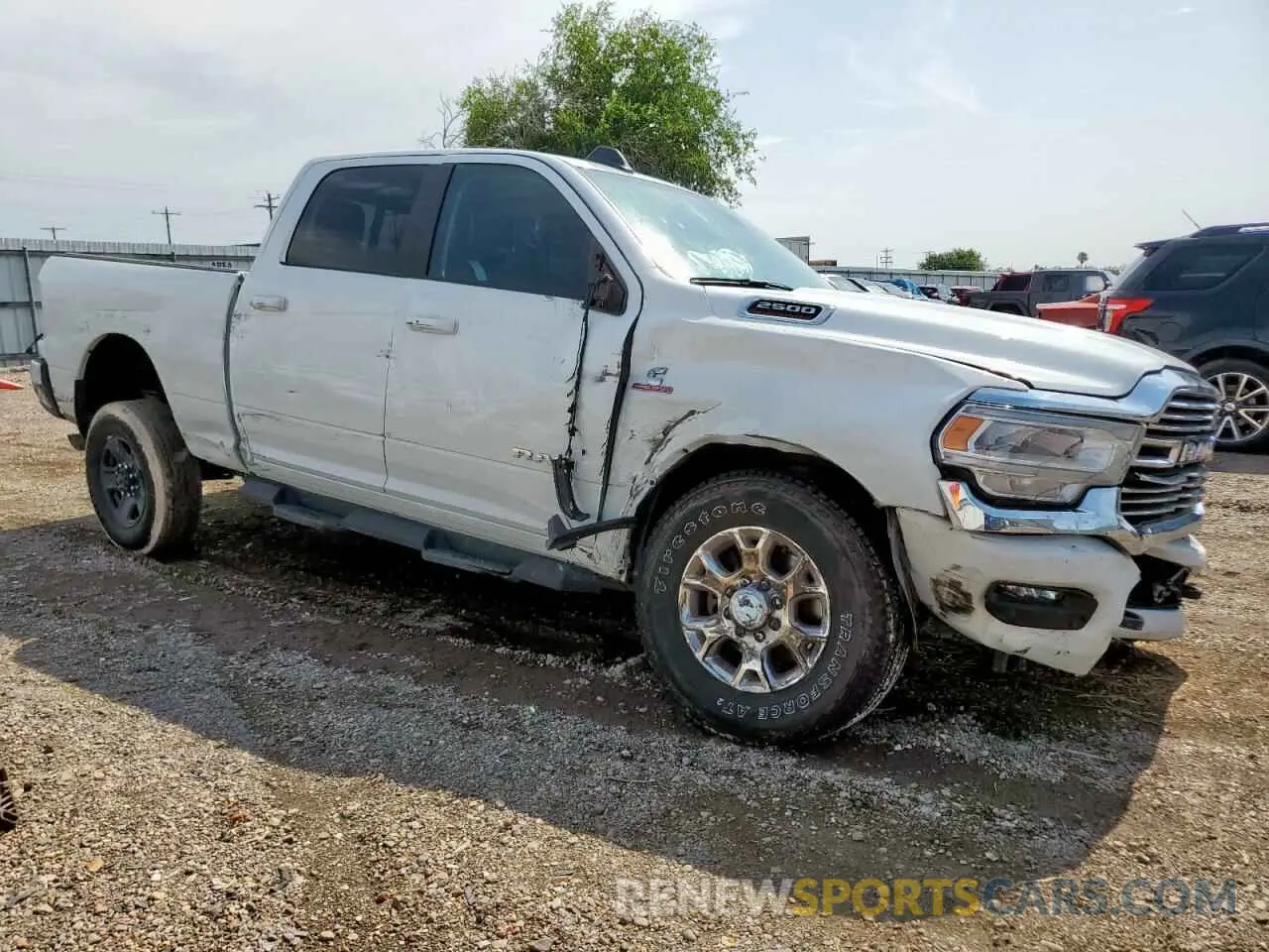 4 Photograph of a damaged car 3C6UR5FL1RG341106 RAM 2500 2024