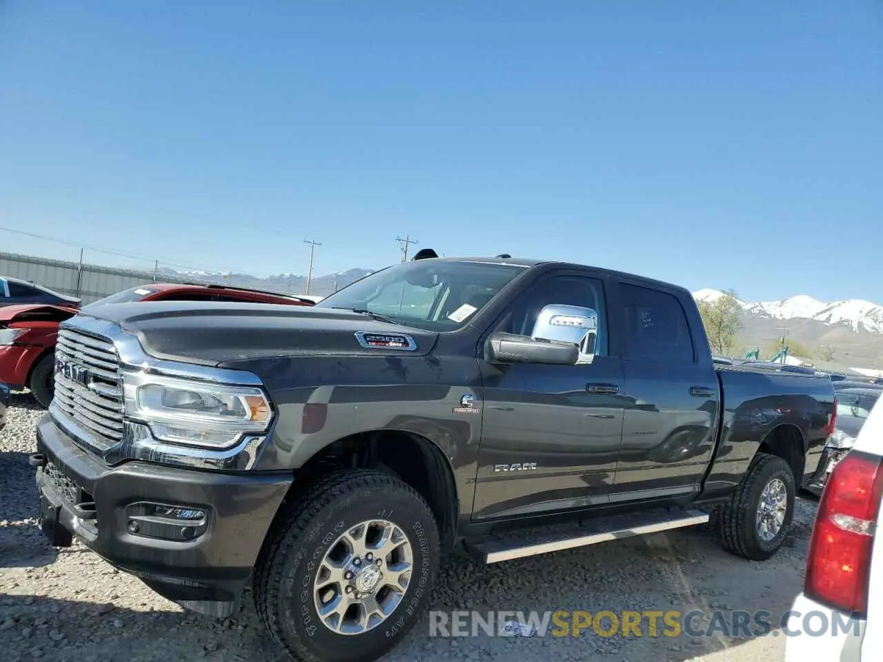 1 Photograph of a damaged car 3C6UR5FL1RG367253 RAM 2500 2024