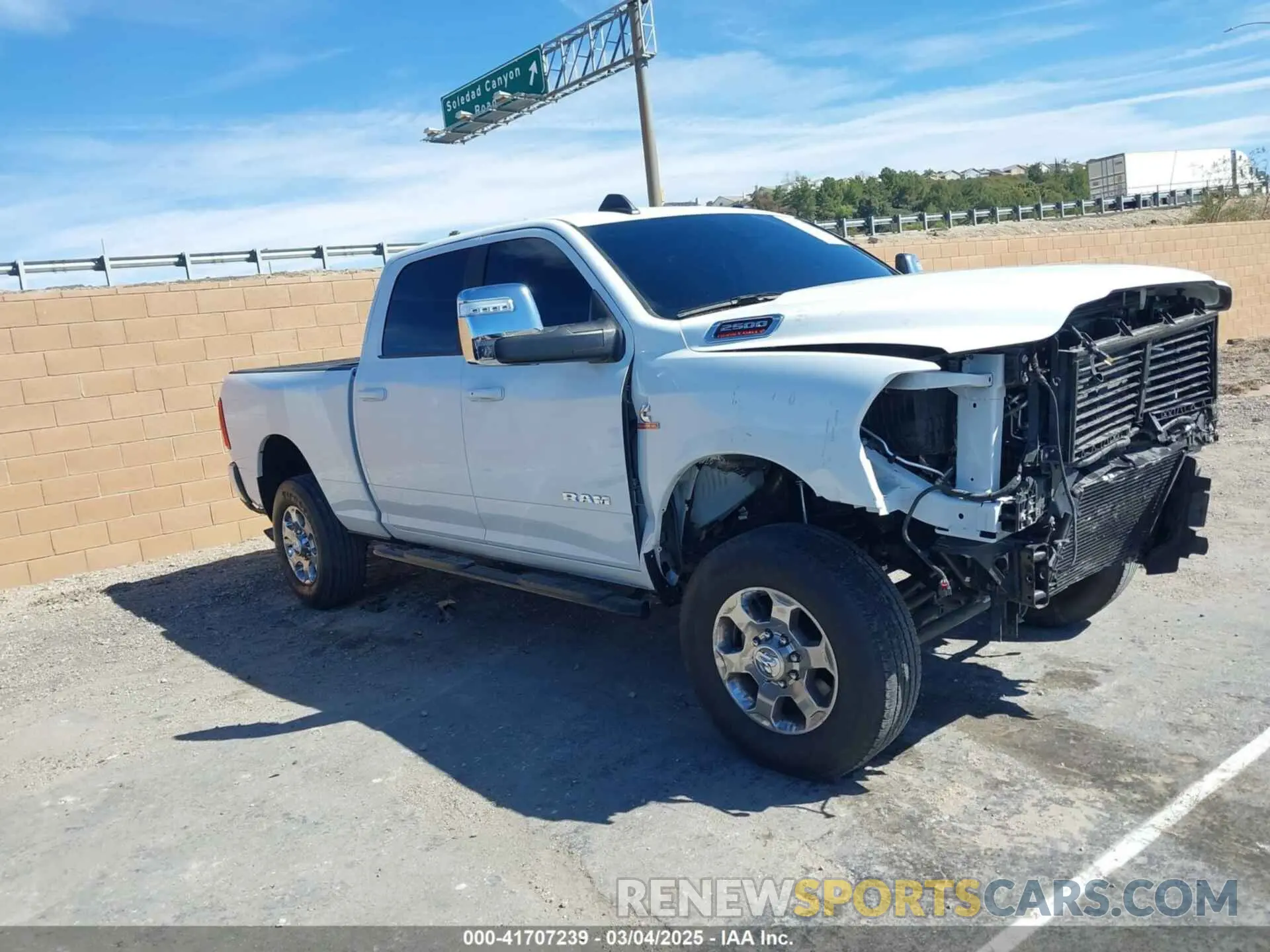 1 Photograph of a damaged car 3C6UR5FL2RG267971 RAM 2500 2024