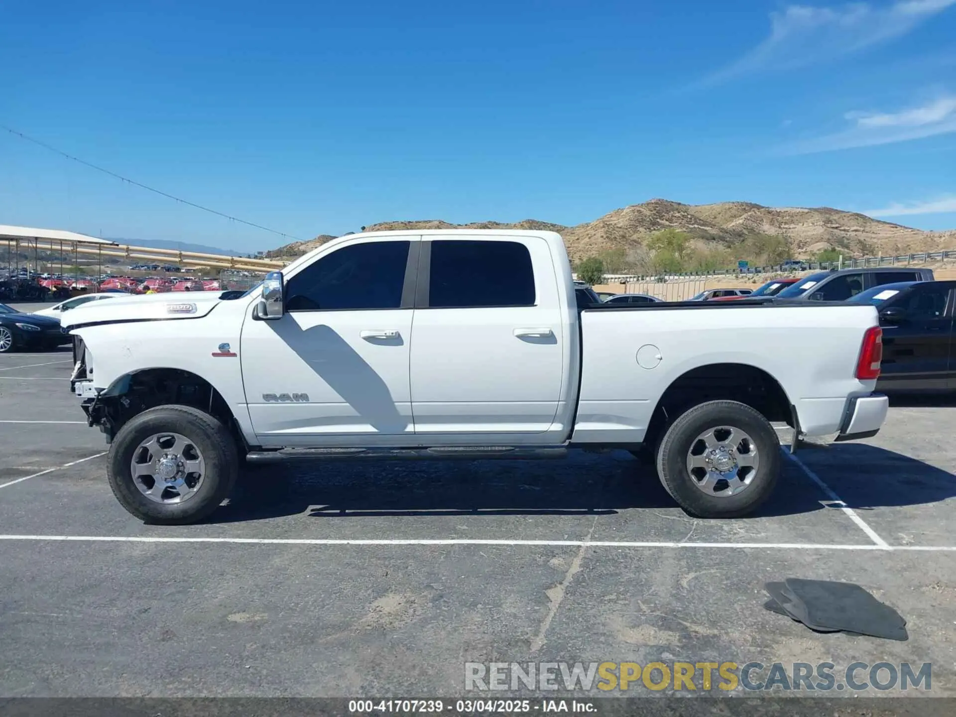 14 Photograph of a damaged car 3C6UR5FL2RG267971 RAM 2500 2024