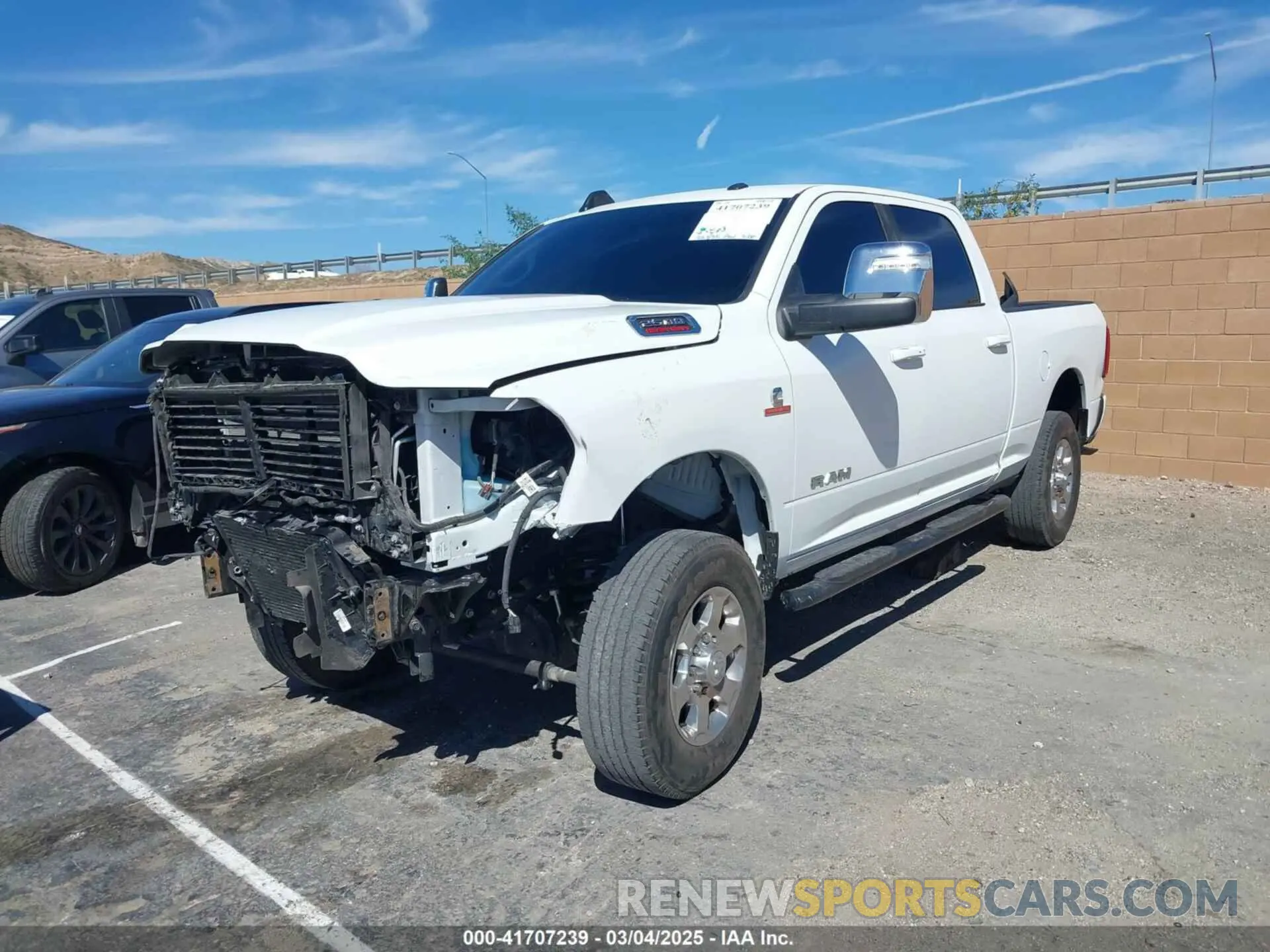 2 Photograph of a damaged car 3C6UR5FL2RG267971 RAM 2500 2024
