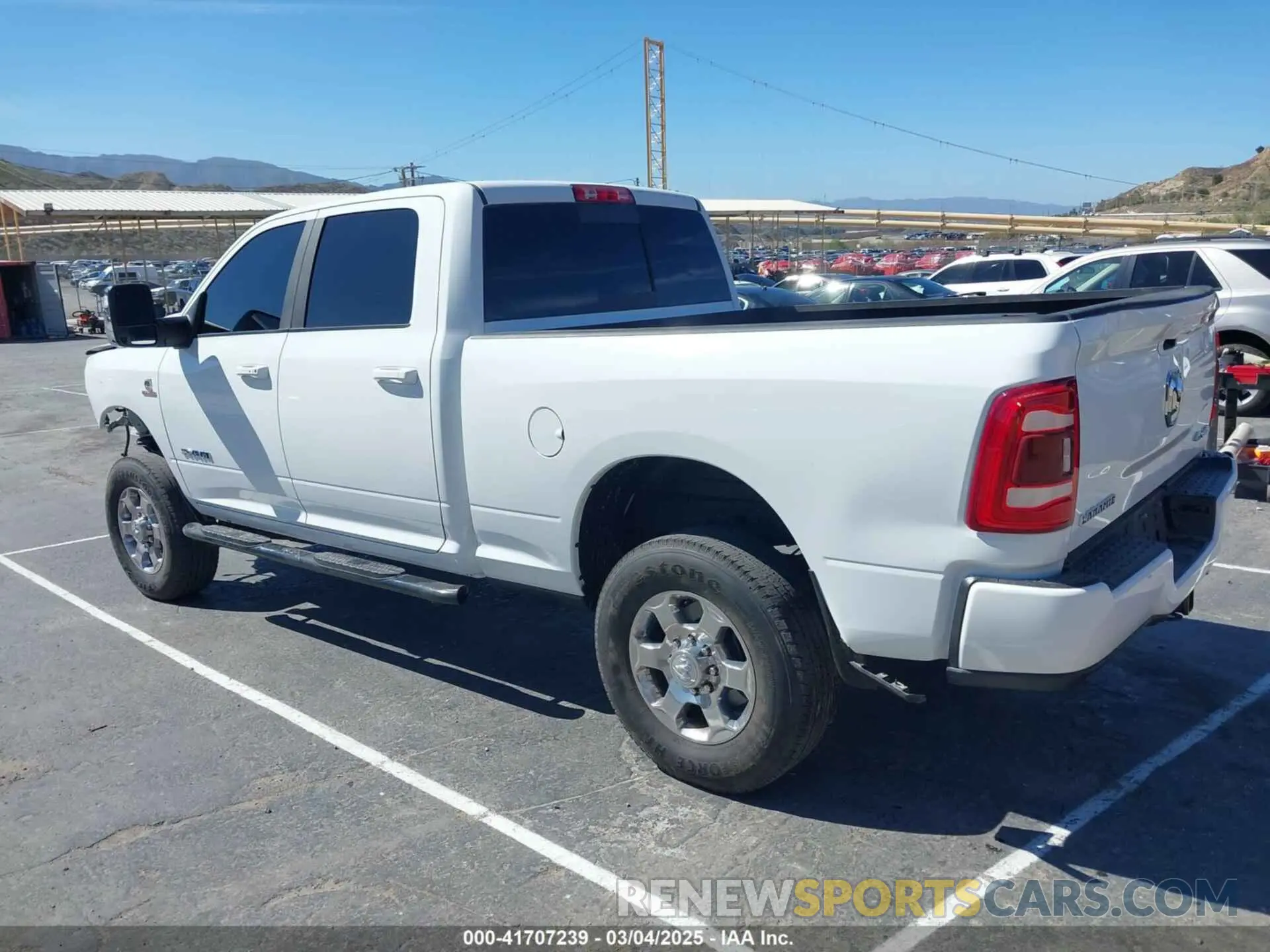 3 Photograph of a damaged car 3C6UR5FL2RG267971 RAM 2500 2024