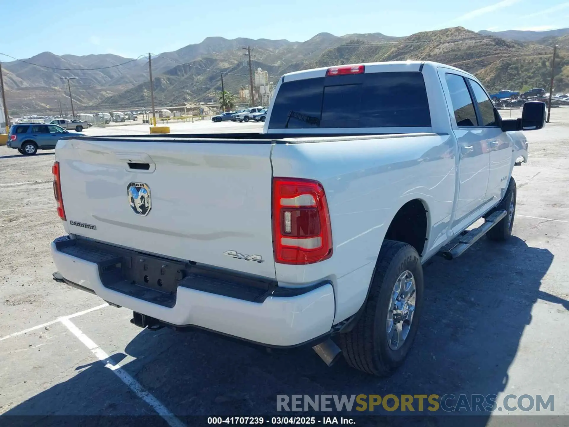 4 Photograph of a damaged car 3C6UR5FL2RG267971 RAM 2500 2024