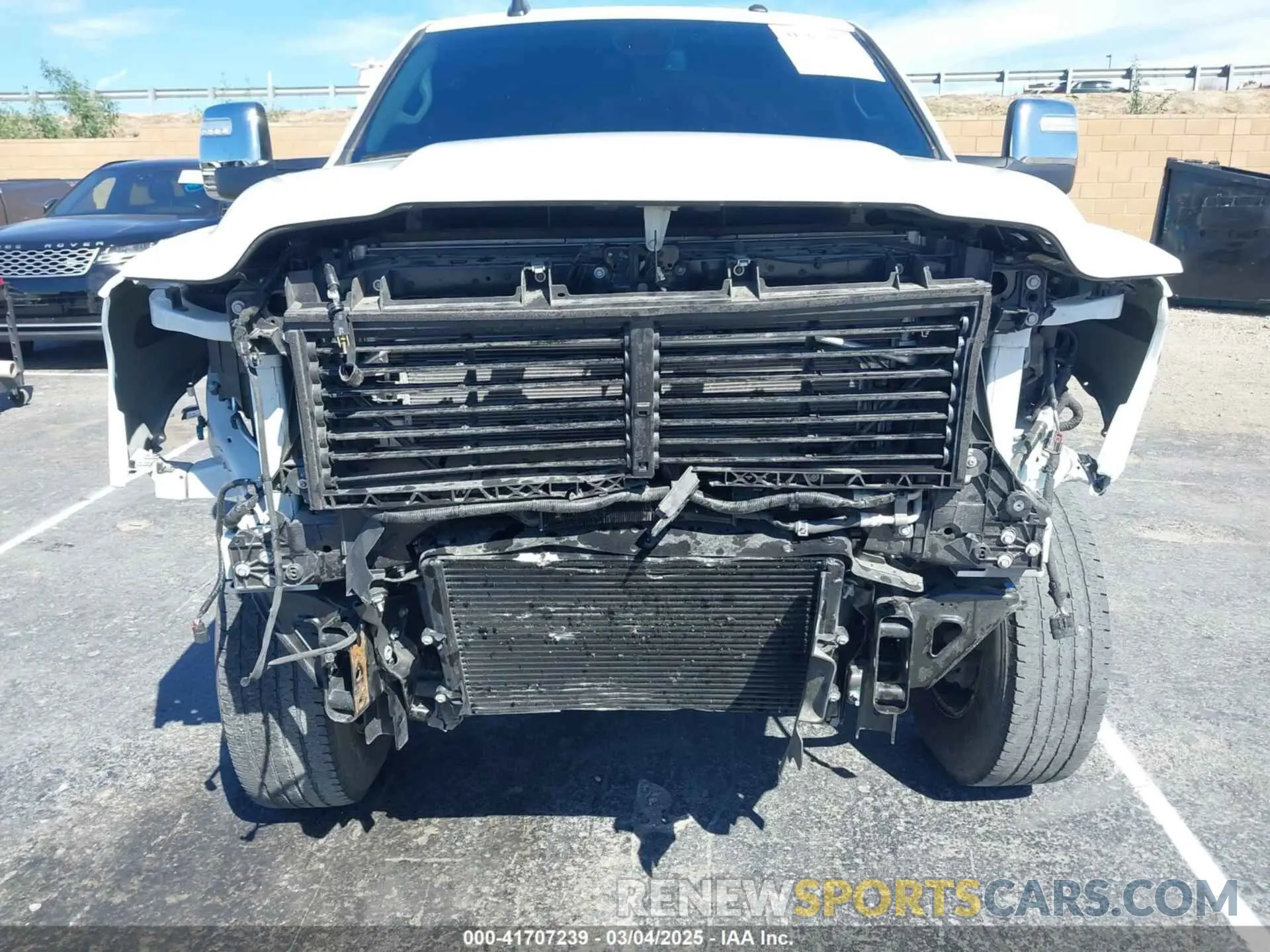 6 Photograph of a damaged car 3C6UR5FL2RG267971 RAM 2500 2024