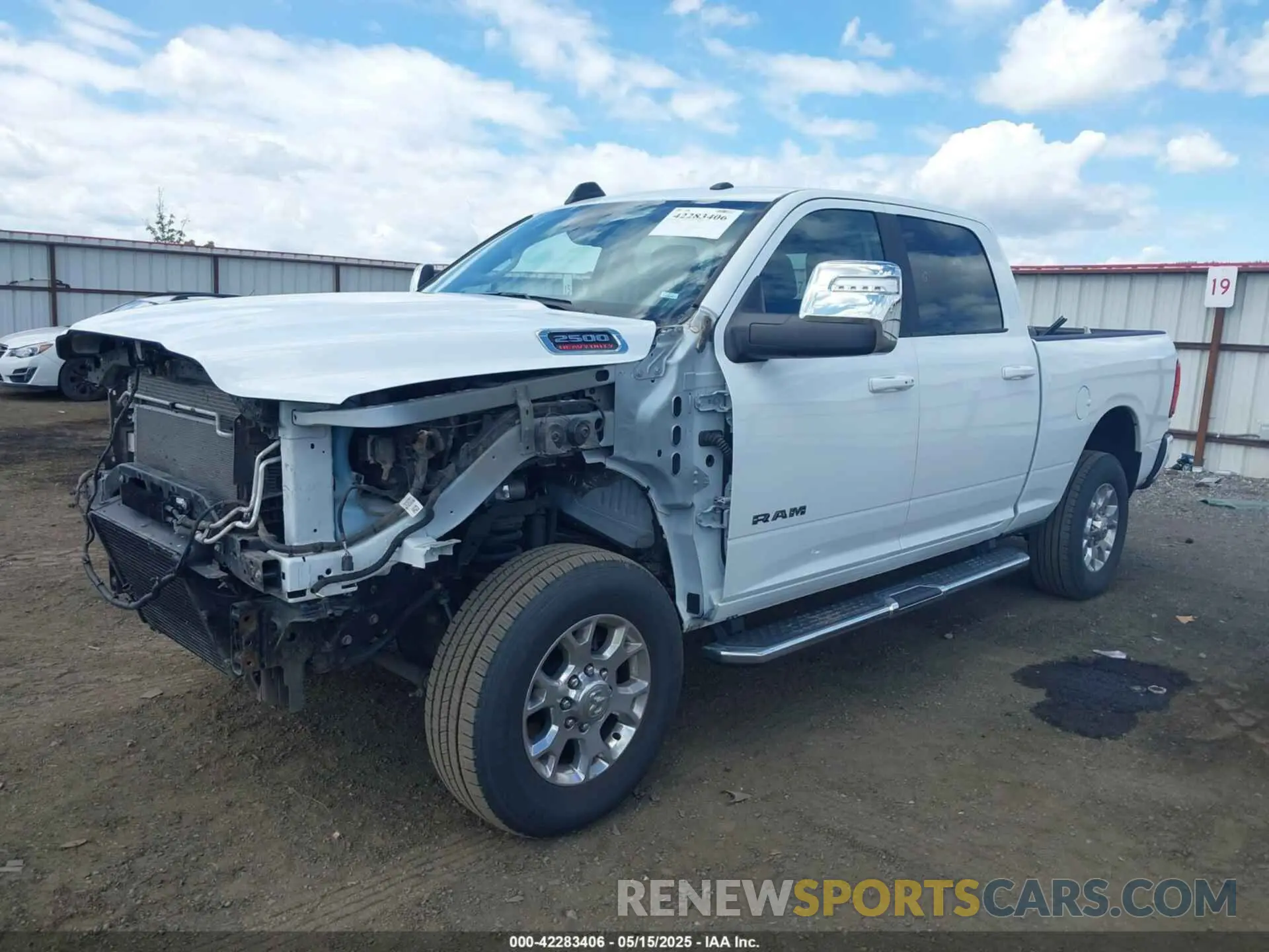 2 Photograph of a damaged car 3C6UR5FL2RG285550 RAM 2500 2024