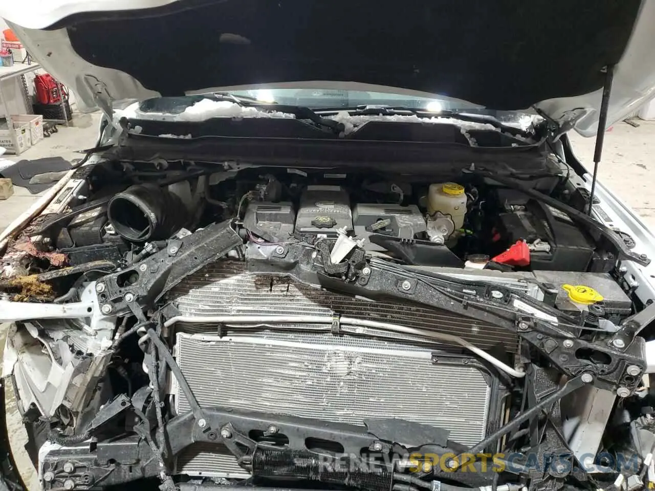 12 Photograph of a damaged car 3C6UR5FL3RG366704 RAM 2500 2024