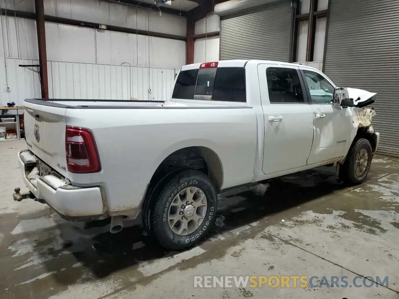 3 Photograph of a damaged car 3C6UR5FL3RG366704 RAM 2500 2024
