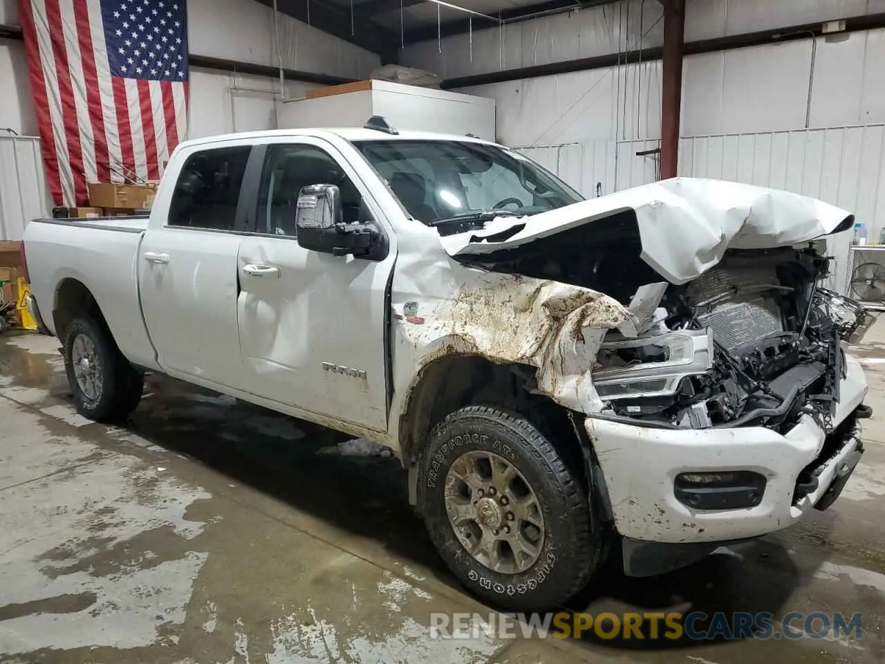 4 Photograph of a damaged car 3C6UR5FL3RG366704 RAM 2500 2024