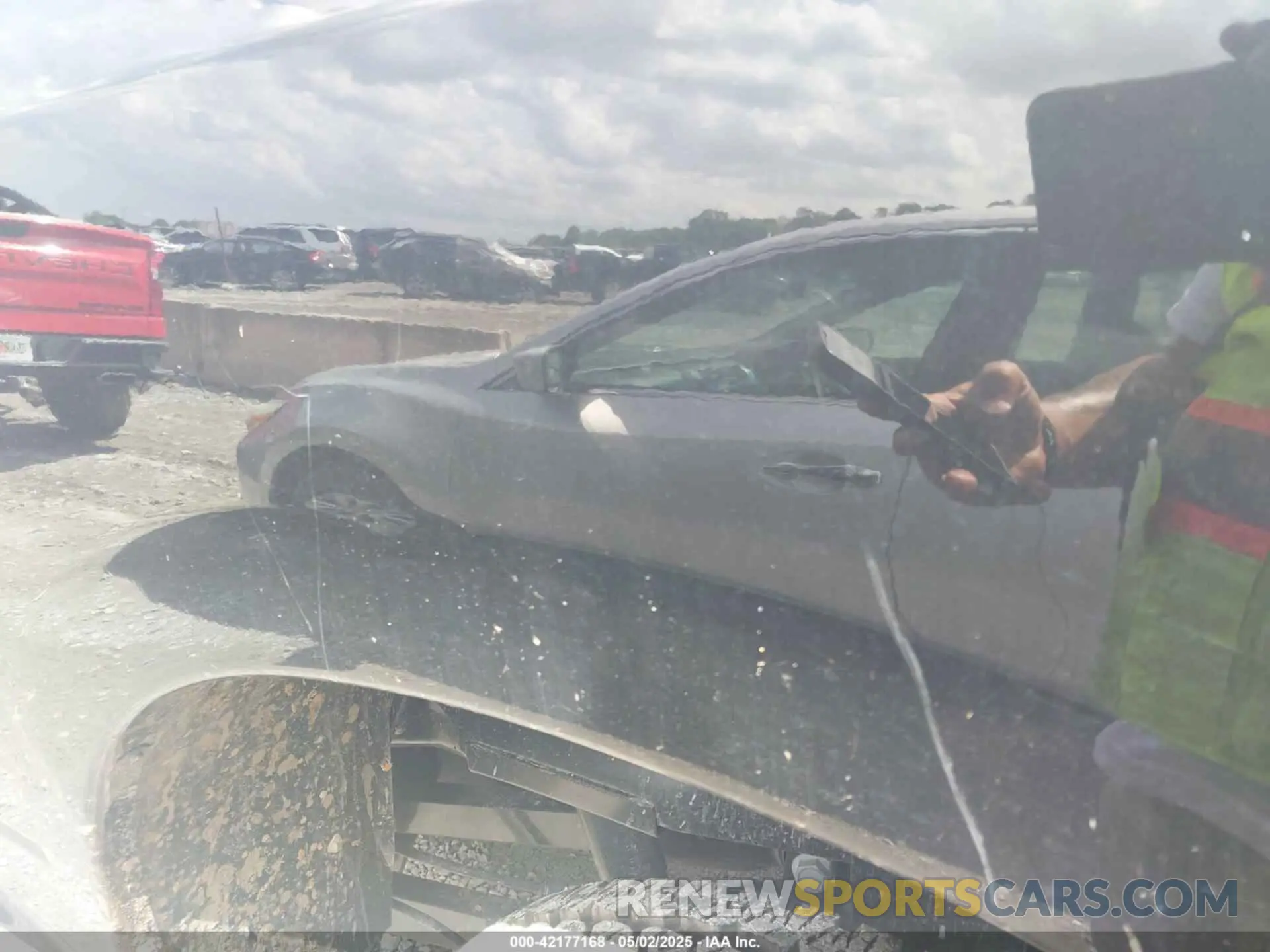 22 Photograph of a damaged car 3C6UR5FL3RG407946 RAM 2500 2024