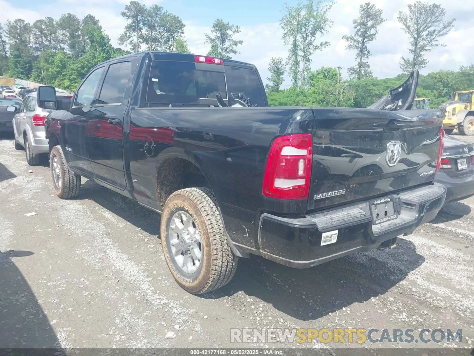 3 Photograph of a damaged car 3C6UR5FL3RG407946 RAM 2500 2024